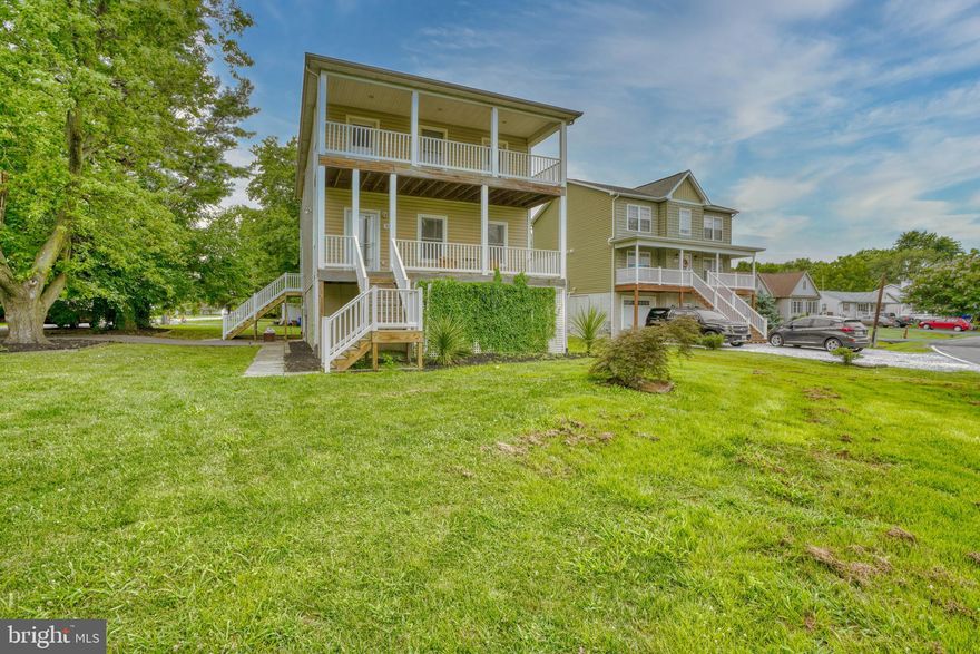 Oh hello Fort Howard!   Located less than thirty minutes  outside of the city you will fall in love with this quiet water oriented community .   This well appointed 3 bedroom 2.5 bathroom home serves you up beach house vibes all year long without the drive, or breaking the bank!   Pride of ownership shines through the moment you walk through the door,  not a dollar was spared on the build,  this homeowner did it right.    Home features  attached garage, THREE decks, super tall ceilings, functional fireplace, pristine hardwood floors, all with water views and nestled in-between  Old Road Bay and Shallow Creek.    You need more space?  You have found it here!   Create your own bonus space with a blank slate framed out  in the basement and ready to meet whatever your needs !    Whether you are sipping cocktails with a view on your deck or cozied up by the fire place you'll be right at home at 9245 North Point.