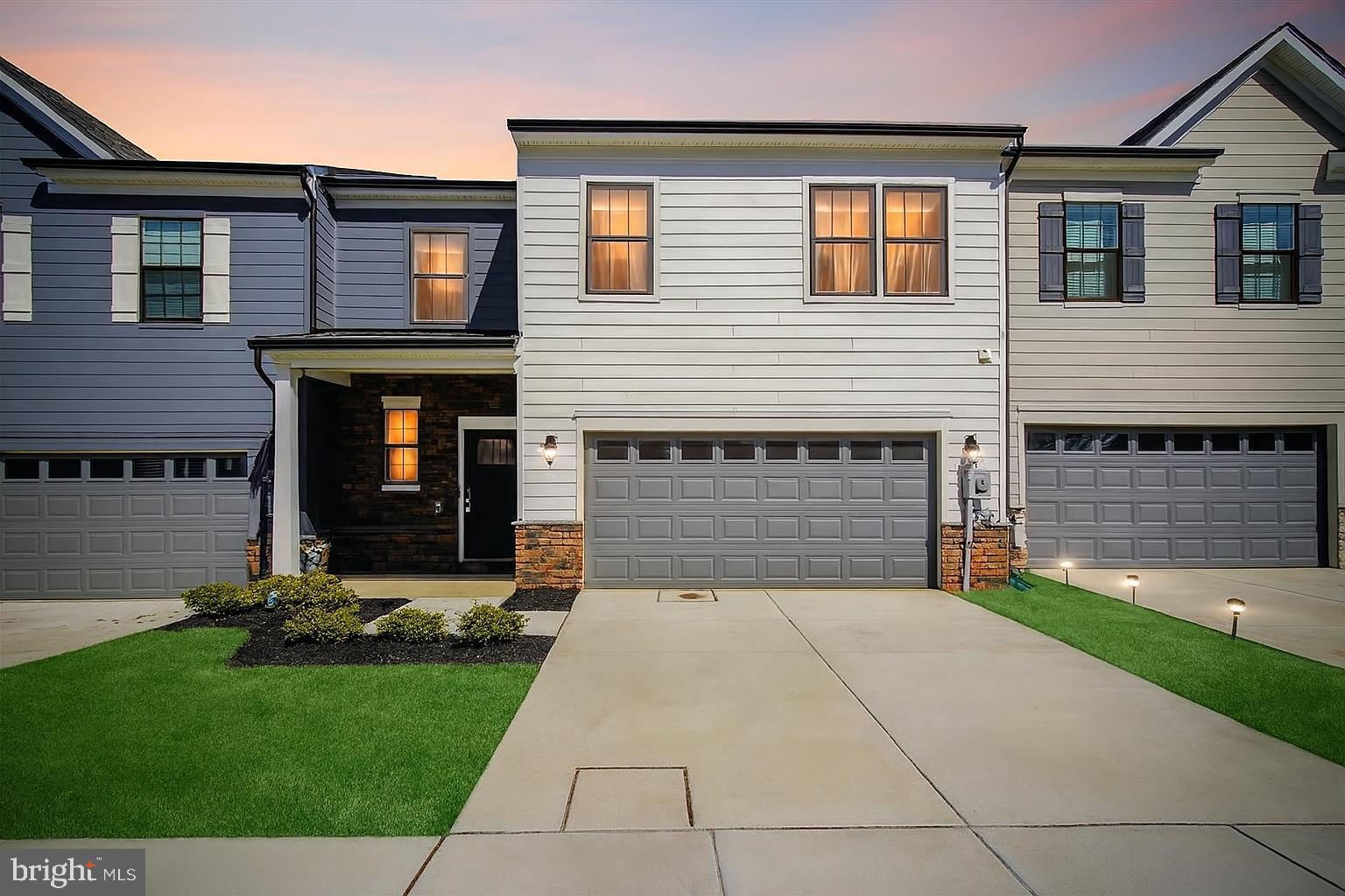 🏡 **Super Pick of the Week! New Price!!**
Why wait to build when this nearly new DR Horton townhome Villa is ready for new owners now! 
Step inside to discover a main-level primary suite, perfect for comfort and ease, paired with a bright, open layout that flows through the stunning quartz kitchen with herringbone backsplash and oversized island.
Upstairs offers even more space — a second suite and an additional bedroom ideal for guests, a home office, or nursery.
Outside, enjoy a fenced backyard with patio, perfect for summer nights, plus a two-car garage and powder room for added convenience.
All this in the vibrant Renn Quarter community, just minutes from Downtown Frederick and major commuter routes.
🚫 This floor plan is no longer being built — don't miss your chance to own a piece of it!