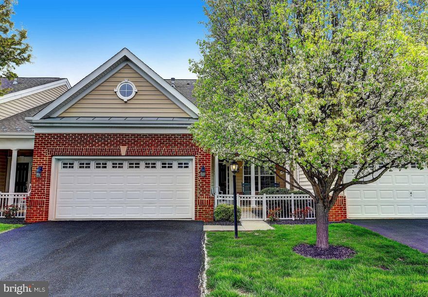 3BR/3BA brick/siding villa in Bulle Rock-1st flr master BR/BA with walk-in, tub, and shower. Additional BR/BA on main. Also offers a LR and sunroom with ceramic and double sided FP. Main level laundry off kitchen and leads to two car garage. Upper level loft with large open area, additional BR/BA. Fresh carpet and paint through much of the home. Community amenities galore.