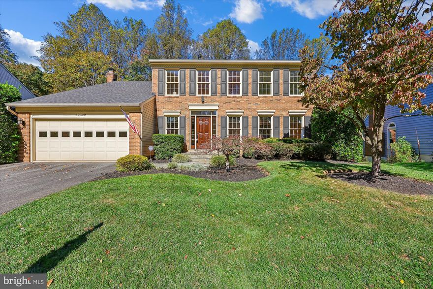 Fall in love with 12329 Galesville Drive, nestled on a quiet street in the desirable Quince Orchard Valley community. This stately colonial offers 3,692 total square feet across three finished levels and features four spacious bedrooms, three full bathrooms, and a convenient powder room.
 Highlights include wide-plank hardwood floors, a chef’s kitchen, updated bathrooms, recessed lighting, crown molding, chair railings, a fireplace, and abundant windows that fill the home with natural light. Set on a meticulously landscaped 0.31-acre lot backing to woods, the property boasts an expansive tiered deck with walk-down stairs leading to the patio and backyard—ideal for relaxing or entertaining.
 At the heart of the home, the high-end French country kitchen showcases granite countertops with a matching backsplash, stainless steel appliances, a Wolf gas cooktop with hood, a premium Dacor refrigerator, a farmhouse sink, a KitchenAid convection wall oven and built-in microwave, a pantry with roll-out shelving, a center island, and a breakfast area framed by windows. The kitchen flows into a spacious family room with a gas fireplace and glass doors opening to the deck. A living room, dining room, and powder room complete the main level.
 Upstairs, you’ll find four bedrooms and two full bathrooms. The spacious owner’s suite features a cathedral ceiling, a walk-in closet, and a second auxiliary closet. The spa-like en-suite bathroom boasts marble finishes throughout—including the flooring, wainscoting, and dual vanity—and offers both a classic soaking tub and a glass-enclosed shower.
 The walkout lower level includes durable LVP flooring, a large recreation room, a full bathroom, a bonus workroom with Craftsman tables and tools, a laundry room, and generous storage space.
 Ideally located just minutes from numerous dining, shopping, and entertainment options, with easy access to major commuter routes. Perfect for outdoor enthusiasts with nearby parks, recreation facilities, and top-rated golf courses. Highly rated schools further enhance its appeal.
 Don’t miss this incredible opportunity to own in one of Montgomery County’s most sought-after communities!
