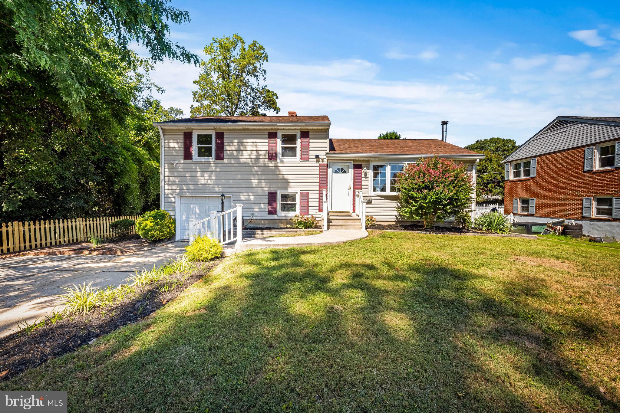 Located in the coveted neighborhood of Rollingwood, this nearly 2,000 SQFT freshly updated and meticulously maintained 4-Level split-foyer is one of the only homes in the area built with the 2nd lower-level family room and features 3-Bedrooms / 1 .5 Bathrooms, an attached garage, and a finished 3-seasons sunroom to the rear! Additional features include refinished hardwood flooring on the top floor, two levels of new hardwood flooring, new LVP in the basement, full and half bath remodels, sunroom remodel, updated hardware and fixtures, and recently renovated kitchen with new quartz countertops, custom backsplash, luxury all-wood birch cabinetry, and stainless-steel appliances. Uniquely positioned beside a tranquil creek and wooded landscape along its left border, this home offers exceptional privacy and entertaining possibilities with close proximity to Westchester Elementary, the historic Trolley Trail, and the scenic Patapsco State Park. This location offers the best of convenience and community. Stroll Frederick Road in Catonsville to discover locally owned shops and eateries, or explore the unique restaurants, boutiques, and antique stores of Old Ellicott City. Commuting is effortless with quick access to Routes 40 and 29, I-95, I-695, Frederick Road, and nearby I-70