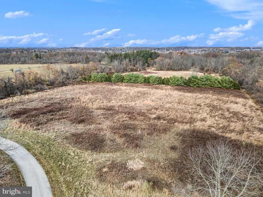 This exceptional 12 acre lot provides the perfect canvas to build the custom home of your dreams. Surrounded by the preserved pastureland of Willow Lake Farm and the historic Highlands, this lot is ideal for those seeking a bucolic estate with every benefit of urban convenience. The gracious winding driveway approaches the home site through private wooded land. The primary building site is expansive, level and open, surrounded by woods and with views over permanently preserved horse farms. 

Located within the excellent Colonial School District and walking distance from Germantown Academy, with an easy commute to center city via Ambler or Ft. Washington train stations. Lot is subject to PA clean and green act 319 with the associated tax benefits.