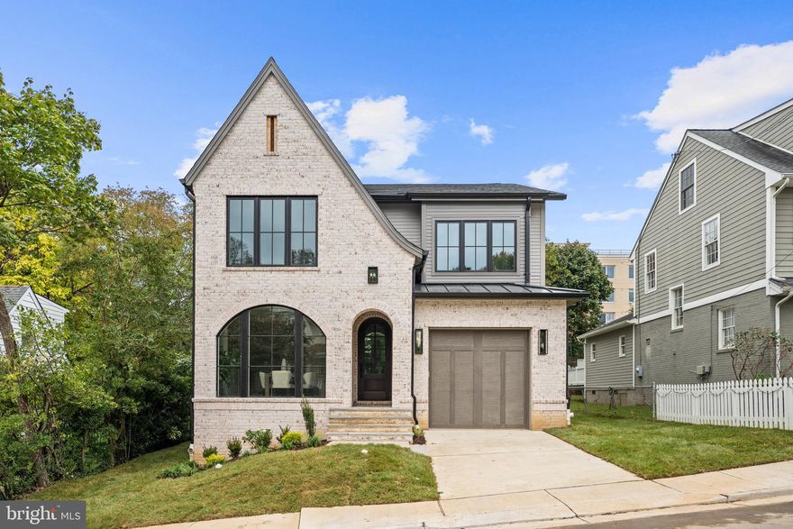 *Builder offering Financing Incentives - Interest rates starting at 4.99% for loan amounts up to $1.5M, other programs available for higher loan amounts, starting at 5.125%. Builder assistance available for qualified buyers. Limited-time offer. **
Introducing The Oakley, a beautifully crafted new construction by Arlington’s premier luxury builder, Classic Cottages. This thoughtfully designed 4-bedroom, 4.5-bath residence perfectly balances contemporary sophistication with timeless charm.
WHAT MAKES THIS HOME STAND OUT?
Inside, an open-concept floor plan seamlessly connects the main living spaces, creating an inviting flow for both everyday living and entertaining. The chef’s kitchen is a true centerpiece, featuring premium stainless steel Thermador appliances, elegant quartz countertops, abundant cabinetry, rich wood flooring throughout, and a generously sized island ideal for gathering.
The owner’s suite offers a serene retreat with a spacious walk-in closet and a spa-inspired bath complete with dual vanities, a soaking tub, and a separate shower. Secondary bedrooms are bright and well-appointed, each offering ample storage and en-suite convenience.
The finished lower level adds exceptional flexibility with a recreation area, wet bar, exercise room, additional storage, and a private guest suite. Outdoor living shines on the screened porch — the perfect spot to relax or entertain year-round. Every detail has been carefully curated with high-end finishes and modern features to deliver a refined, comfortable lifestyle.

WHAT MAKESTHIS LOCATION STAND OUT?
Ideally situated in sought-after Maywood, this home offers the perfect blend of neighborhood charm and urban accessibility. Enjoy close proximity to neighborhood dining and shopping, including Lee Heights.

Commuters will love the convenience of being just about a mile to both the Ballston and Clarendon Metro stations, with easy access to major commuter routes including I-66 and the Metrobus line. Plus, you’re just minutes from Washington, DC — making this location as practical as it is desirable.

ABOUT THE BUILDER
Classic Cottages is a premier Northern Virginia custom home builder with more than 15 years of success and a reputation for quality, consistency, and exceptional client service. As a fully integrated firm, Classic Cottages manages every stage of the process — from land acquisition and architectural design to construction and warranty — ensuring a seamless and transparent experience. Buyers have the flexibility to build fully custom, personalize a semi-custom plan, build on their own lot, or purchase a move-in-ready home. Known for elevated finishes, thoughtful layouts, Classic Cottages delivers homes that consistently over-deliver on value, comfort, and livability.