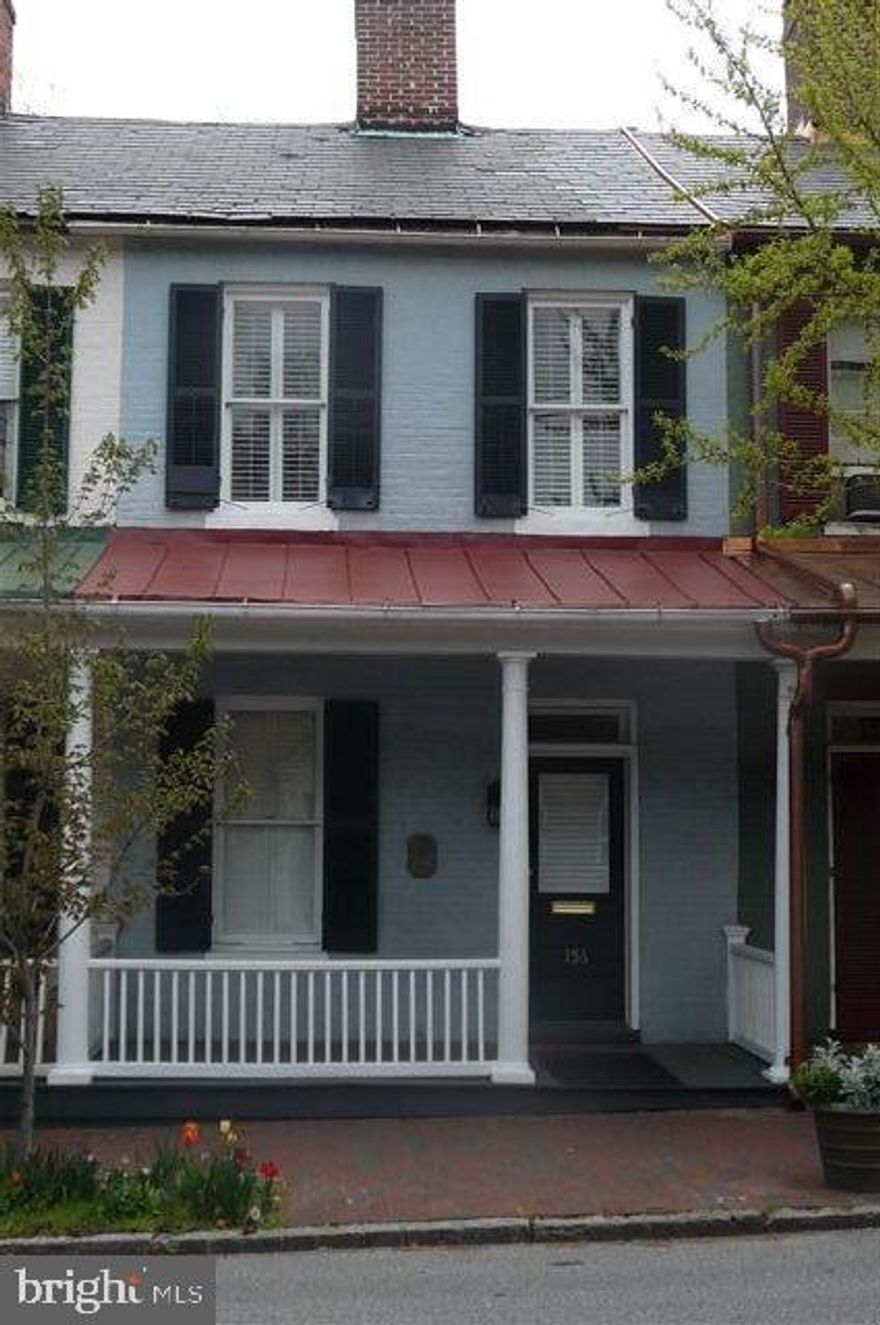 This House is great inside & represents downtown living at it's best. This home features 3 bedrooms, wood floors; crown molding; and excellent built ins for storage. Master bedroom has fireplace & so does living room & dining room. Beautiful renovated kitchen leads to a spacious patio & garden; inviting front porch too. Walk for coffee, dining, shopping and City Dock.  Pictures are from before tenants moved in and now.  Please excuse boxes as tenants are moving.