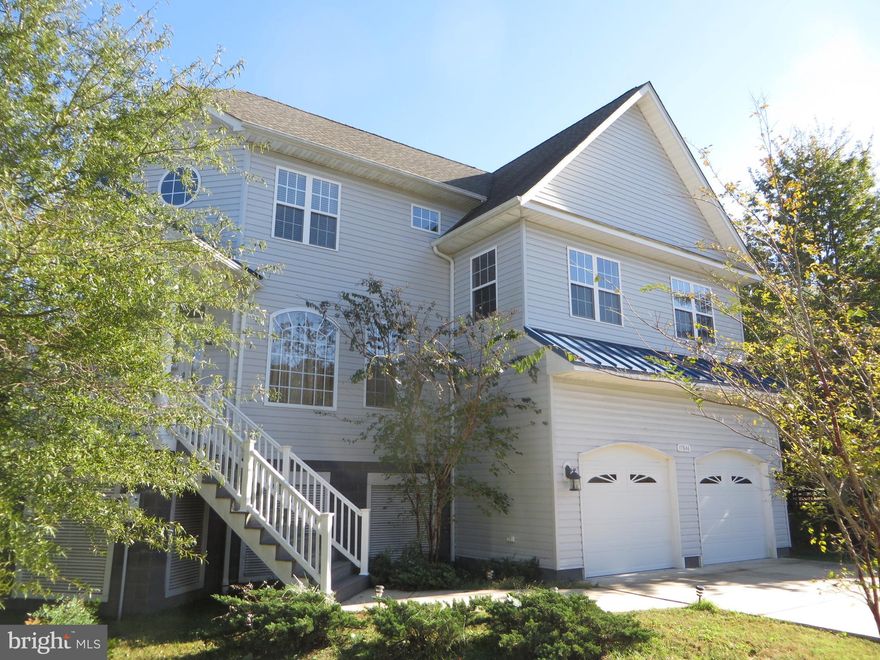 Contemporary Gem in Tall Timbers! This 4 bedroom, 3.5 bath beauty is an easy commute to PAX or Webster. Rich hardwood flooring greets you and stretches from the foyer to the great room and kitchen of this open concept home. Lots of windows provide natural light and lovely views of the pasture beyond. Beautiful kitchen with cherry cabinets, granite counters and stainless appliances. Entertaining is easy with a bonus wine rack and wet bar. Get ready to cozy up in front of the fireplace this Fall.  The private master suite features a cathedral ceiling, large walk in closet and bathroom.  An additional three bedrooms provide plenty of space for all your needs. Come home to a peaceful cul de sac setting into a two car attached garage. An above-ground crawl space has room to stand, work bench and plenty of storage space. Piney Point Elementary is just minutes away and this neighborhood goes to Leonardtown High School.