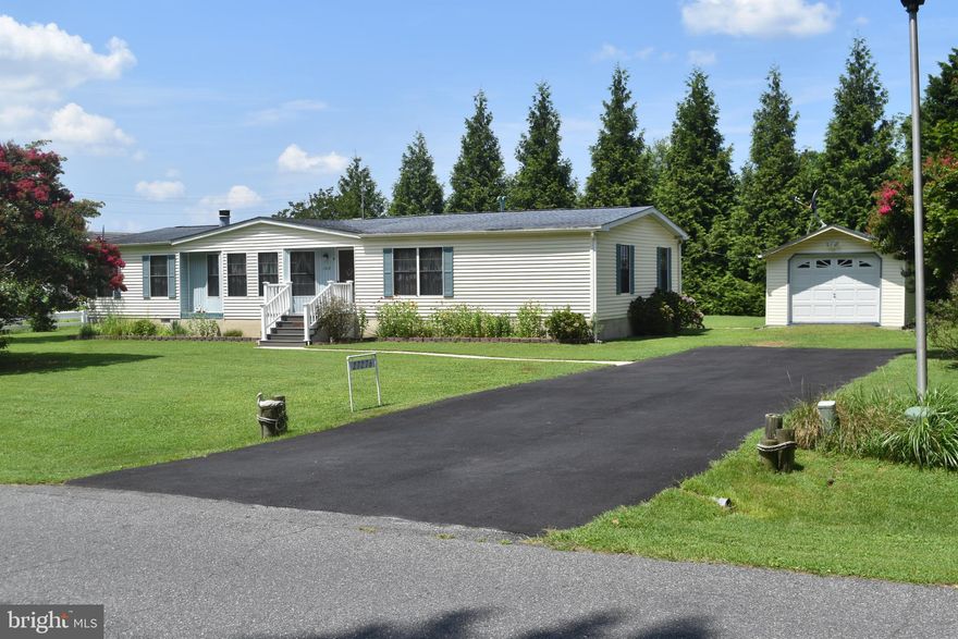 Welcome to this charming three-bedroom, two-bath coastal Class C  home  on  a concrete foundation and is perfectly located near the bay  just moments from public boat ramps and the Indian River Yacht Club. Enjoy the best of coastal living with a beautiful office area, kitchen and baths, offering both style and functionality. While conveniently close to  shopping, dining, and resort amenities, the home is tucked away just enough to provide privacy and comfort.  
Set on a very  spacious lot in this quiet neighborhood, the property also features a detached building currently used as a garage and workshop, offering  extra storage.  Community highlights include easy access to area resorts, golf courses, restaurants, and more—making this a perfect retreat for year-round living or a vacation getaway.