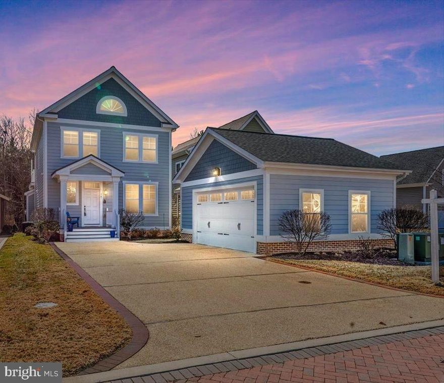 WELCOME TO THE HIGHLY DESIRED NEIGHBORHOOD OF GIBSON'S GRANT on Maryland's Tranquil Eastern Shore! This Pristine and GORGEOUS Home will WOW you... so get ready! As you drive past the Kayak/SUP Launch and Walking Trail on Macum Creek, you are greeted with a Custom Brick Paver Road, exclusive to this very Private  Cul-De-Sac Location within the Community. To the right is the Original Gibson Manor House with views of the Chester River, a tributary of the Chesapeake Bay and to the left is the oversized Driveway and Large Detached 2 Car Garage of 147 Carriage Heath! The Cutest little porch Greets you and Welcomes you HOME every time! Upon entering you can't help but fall in LOVE with the most beautiful Hardwood Floors and the Grand foyer offering Crown Moldings, Chair Rail and significant Molding Trim!  The Enormous Gourmet Kitchen is sure to please with lots of Light, Sprawling Granite Island/Breakfast Bar, ample Granite Counterspace, Beautiful Custom Backsplash, desired White 42" high Cabinets, SS Appliances and Table space for Eat-In Kitchen!  The Open Living Room is just off of the Kitchen which is great for entertaining and has a stunning Gas Fireplace and luxury custom wainscotting! Side door leads to Grilling deck and lounging brick paved patio.  Working from home? Easy to do in this Home Office with charming French Doors and lots of Natural Light! The Spacious Primary Suite is sure to please with Walk-in-closet, En-Suite Bath boasting Dual Vanity Sinks & walk in Shower. To top it off is the window paned door leading to the composite Upper-Level Deck with peaceful views of the Sunsets and Macum Creek! Check out the views from the 2nd and 3rd Bedrooms, both very roomy with large closets.  TONS of GREEN space in the front and back yards.  Come LIVE the SHORE LIFE here in the sought-after coveted Gibson's Grant with the many community amenities... it will not disappoint! Clubhouse, Pool, Playground, Trail, Gym, Party Room, Sunset Fishing Pier, Kayak Launch, SUP, Picnic Area & outdoor dining area! Just steps to the popular Kent Island bike and walking trail, super close to the Shops and Restaurants at the Kent Narrows, minutes to the Outlets, Beaches, Marinas, Parks, Boat Ramps and the Bay Bridge.  Easy commute to Annapolis, Balto, DC.