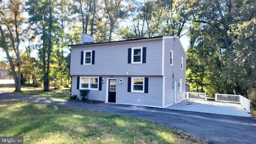 WOW — THREE LOTS INCLUDED IN THE SALE! LOTS 39, 40 & 41! Welcome to this beautifully updated, light-filled brick colonial in desirable Engleside Village, offering exceptional space, comfort, and value — all with no HOA! This charming home sits proudly on an expansive triple lot and features 3 spacious bedrooms, 2.5 beautifully updated baths, and an oversized parking area. The main level showcases new hard-surface flooring, fresh designer paint, and an open-concept kitchen with granite countertops, stylish backsplash, and brand-new stainless steel appliances. The kitchen flows seamlessly into the dining area, where sliding glass doors lead to an expansive backyard — perfect for entertaining, barbecues, or simply relaxing outdoors. A cozy wood-burning fireplace adds warmth and charm to the living room, while an updated half bath completes the main level. Upstairs, you’ll find brand-new carpet, fresh paint throughout, and a convenient new laundry area. The primary suite offers a private retreat with its own updated bath, while two additional spacious bedrooms share another fully updated hall bath—ideal for family or guests.
The location couldn’t be better! Just steps from the elementary school and minutes to Mount Vernon High School, this home is surrounded by shopping, restaurants, and grocery stores. Enjoy quick access to Richmond Highway, Taft Highway, and Fort Belvoir (5 minutes), with Old Town Alexandria only 15 minutes away, National Airport 25–28 minutes, and the Pentagon and D.C. in about 30 minutes. This move-in-ready home delivers the perfect blend of comfort, convenience, and charm—plus the rare bonus of three lots included in one incredible opportunity!