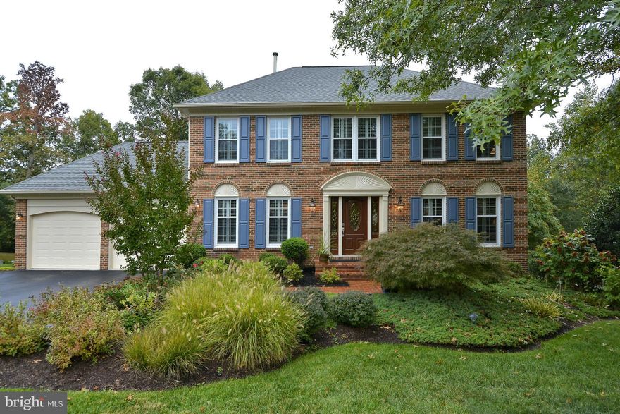 Rarely available lot! Large landscaped, fenced back yard lot backing to woods leading to Lake Mercer Hardwood Floors on Main and ULevels Granite counters Tiled backsplash newer fridge(2014)microwave(2014)Bosch dishwasher(2014)Samsung front loan W/D w/pedestal storage, Remodeled Baths(3.5) Enlarged Fam Rm on Main Lvl walk-out Lower Lvl to Stamped Concrete Patio Trex 2 Tiered Deck Owner RE Licensee