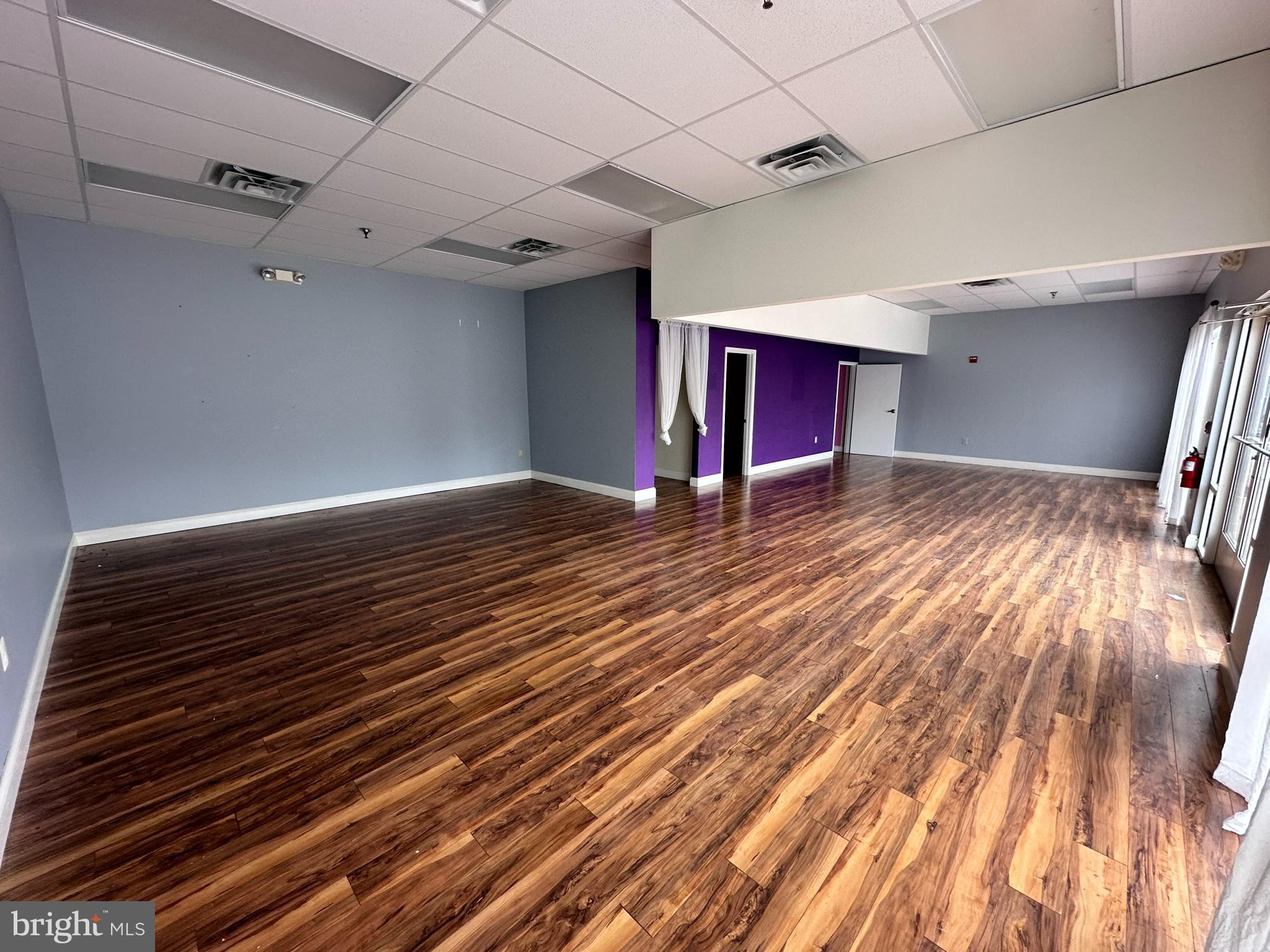 JACKSON SQUARE BUSINESS - Commercial Lease