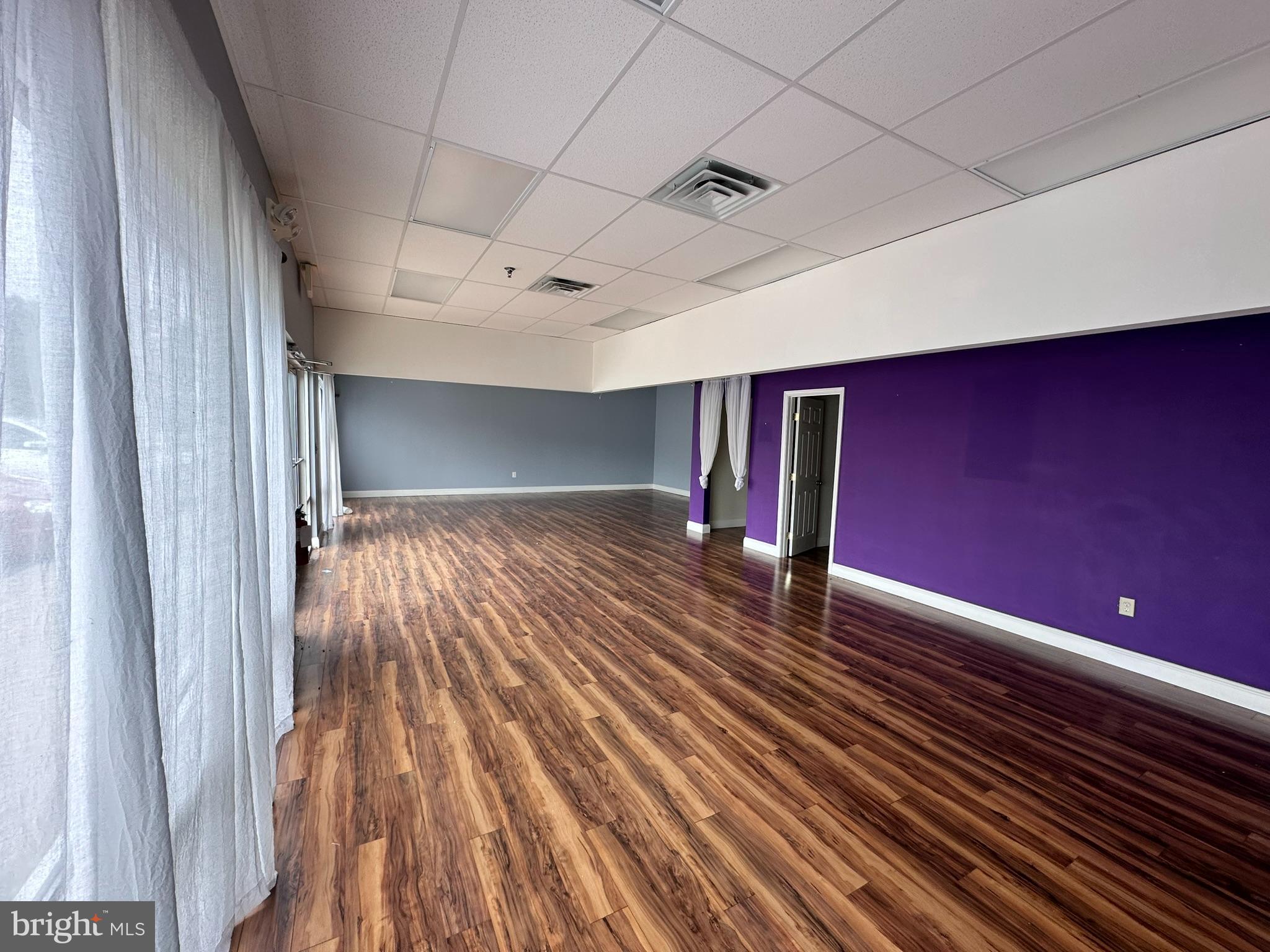 JACKSON SQUARE BUSINESS - Commercial Lease