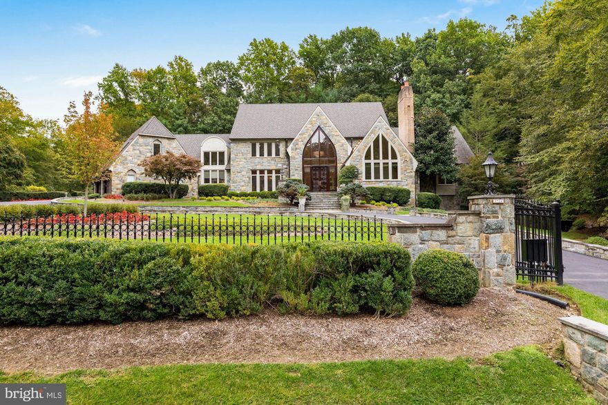 Welcome to 9724 Sorrel Avenue! This stunning gated estate is situated on just over 2 acres of land within the Falconhurst community in Potomac. With over 14,000 square feet of living space this home truly has it all. The highlights of this home include a gorgeous indoor swimming pool with spa, 4 car garage, and private in-law suite. In total there are 6 bedrooms, 7 full bathrooms and 2 half baths. The main level features a grand entry with a two story cathedral ceiling. You have spacious formal living and dining rooms. The cathedral ceilings continue in the family room with gorgeous views of the backyard and a wood burning fireplace with floor to ceiling stonework. The eat-in chef's kitchen has tons of natural light with stainless steel appliances, a large island, and custom two tone cabinetry. The kitchen has direct access to the large slate stone back patio perfect for indoor outdoor living. The main level also includes a private office with fireplace and custom millwork. Lastly, the main level master bedroom has vaulted ceilings and floor to ceiling windows letting in tons of natural light. You have beautiful views of the trees and foliage as well. The master ensuite has double sinks with a built in vanity, soaking tub, and walk-in tile shower. There is also a walk-in closet with a custom closet storage system and a private balcony overlooking the grounds. Perhaps the coolest feature of this master is the direct access to your indoor swimming pool via a spiral staircase. The upper level of this home features 4 additional bedrooms and 4 bathrooms. You also have a safe room, cedar closet, and bonus room. The lower level of this property is fully finished with a private in-law/guest suite including laundry and a full kitchen. You have a large rec space with another stone wood burning fireplace, billiards room, and a full built-in bar. There is direct access to the swimming pool from the lower level. The indoor pool and spa has beautiful stone work and views of the trees. You also have another wood burning fireplace, private changing rooms, and full bathroom. In addition you have direct access to the back stone courtyard with lush landscaping including a serene water feature and walking path. This property is the ideal combination of closeness and spaciousness within 20 minutes to Washington DC and other major travel routes. You are minutes from prestigious Congressional and TPC Avenel Country Clubs. Don't miss the opportunity to live in this stunning home!