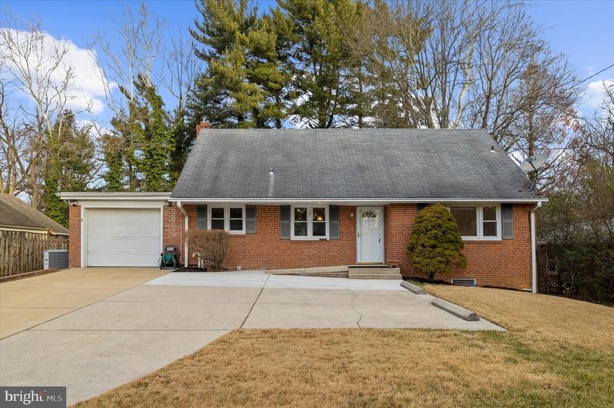 Classic charm, space to grow, and a canvas ready for your vision—welcome to 2930 Powder Mill Rd in Adelphi. Set along a double-yellow main road, this home offers surprisingly easy daily function thanks to an oversized driveway with two exterior parking spaces plus a single-car attached garage (with a 1-year-old garage door opener), making entering and exiting the roadway simple and convenient. Inside, you’ll find an impressively flexible layout with two bedrooms on each level—a total of 6 bedrooms and 3 full baths—ideal for multi-generational living, extended guests, or multiple home office options. The home is sprinkled with pops of color and vintage character that are circling back with today’s trends, making this a fun opportunity for someone ready to personalize and modernize at their own pace—and build equity while doing it. Bonus: Hardwoods are believed to be under the upstairs carpet, just waiting to be revealed. The kitchen is supported by major updates where they matter most: appliances are less than 5 years old, the windows are approximately 10 years old, the HVAC is a 3-year-old Carrier unit, and the home is zoned with a seperate ac unit and thermostat on the upper level, the water heater is 2 years old. Downstairs, the basement kitchenette adds excellent versatility with an additional refrigerator (no ice maker)—perfect for entertaining, extended-stay guests, or a separate meal prep space. Cozy up in any season with two gas-fed fireplaces, and enjoy added peace of mind with three sump pumps plus drain tile around the home for waterproofing. Outdoors, you can enjoy an additional outdoor retreat with a detached screened porch with power—ideal for morning coffee, game nights, or summer dinners without the bugs. A storage shed provides extra room for tools and seasonal items. Zoned commercial, this property offers a unique layer of opportunity for the right buyer (buyer to verify intended use), while still delivering the warmth and nostalgia of a home that’s been loved over the years. The roof is approximately 20 years old.  If you’re looking for charm, space, and a home you can truly make your own—this is the one to see.