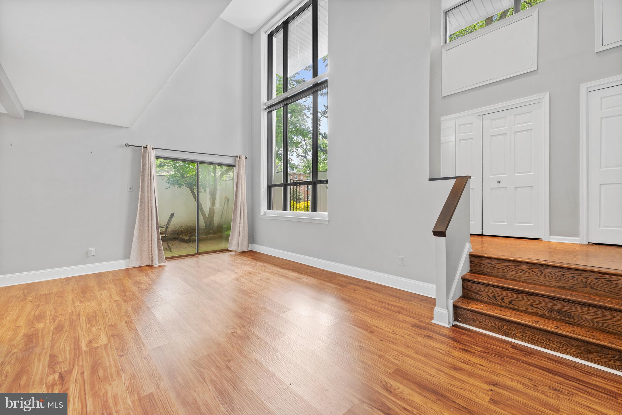 Every once in a while, a home comes along that just feels right—where light pours in, rooms flow effortlessly, and LOCATION couldn’t be more perfect. Tucked away in one of Haverford’s most desirable pockets, this 1800+ sq ft townhome is one of those rare finds.
Step inside and be greeted by a dramatic two-story foyer—bright, open, and spacious—with a coat closet and bonus storage tucked cleverly away. The first floor invites you in with an airy living and dining area, updated laminate floors, and sliding glass doors that lead to your own private patio retreat. Whether it’s coffee at sunrise or dinner under the stars, it’s a space you’ll never want to leave.
The kitchen, fully renovated in 2020, still shines with LG stainless steel appliances, granite countertops, modern lighting, and plenty of workspace for any chef-at-heart. A sleek powder room and full-size laundry room with extra storage complete the main floor.
Upstairs, a stunning two-story atrium window fills the second-floor great room with natural light. A cozy wood-burning fireplace anchors the space—perfect for movie nights or quiet moments with a book.
On the third floor, the private primary suite offers a peaceful escape with generous closets and its own en-suite bath. Two more bedrooms—with beautiful light and ample storage—share a full hall bath with a skylight and double vanity.
And let’s not forget: a new Lennox HVAC system installed in 2020, two dedicated parking spots, and truly low-maintenance living.
All just a short stroll from Suburban Square, the Ardmore Farmers Market, boutiques, cafés, fitness studios, and both SEPTA and Amtrak rail lines. It's also conveniently close to top-rated public schools and prestigious local universities, making it a smart and well-rounded choice for Main Line living.
It’s the perfect blend of urban walkability and suburban charm—right here in prime Haverford.
This is more than a home—it’s an opportunity. A lifestyle. And it all starts with one word: LOCATION.