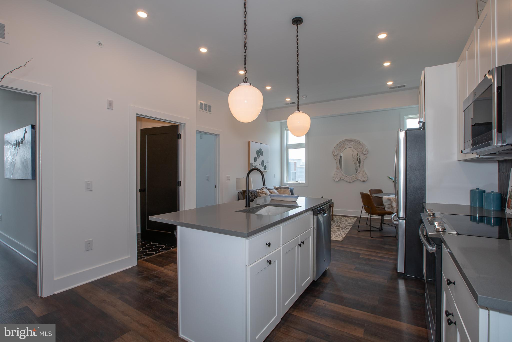 *Available 8/1/2024*
Welcome to The Porter, Brewerytown’s hottest apartment building just a few short blocks off bustling Girard Avenue and in close proximity to ALDI Supermarket and Fine Wine & Spirits. All Porter residents have access to see the center city skyline views from the uniquely designed, fully furnished rooftop deck! This spacious 2 bed, 2 bath apartment comes equipped with keyless entry systems, a breakfast bar with sleek grey countertops, modern 42-inch white shaker cabinetry, sleek matte black fixtures, high-end GE stainless appliances, floating vanities, glass-enclosed showers, black hexagon/black penny tiles floors, custom California styled built out closets, and a ton of natural lighting from the massive windows throughout. The Porter has a millennial lounge that is beautifully designed with a fireplace and a fully furnished workspace. All residents can enjoy the fitness center that is stocked with all of the top-of-the-line gym equipment you could ever need and limited on-site parking is also available for added convenience.
*Pricing reflects the net effective rent after a 1 month credit is applied to a 12 month lease at $1850/mo.
*Limited garage parking is available for an additional $150/mo fee.
*Pets permitted with owner approval. $250 non-refundable fee and $35/mo rent per pet required.
*Photos of a similar unit in the building. Finishes may vary.
Please call to schedule an appointment for a showing!