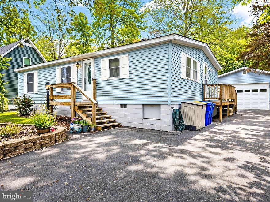 Welcome to this well-maintained rancher tucked away in a quiet neighborhood just 3 miles from the beach. This 3-bedroom, 2-bath home offers a comfortable layout with a spacious family room, an eat-in kitchen, and a bright sunroom overlooking the backyard.  The true highlight of this property is the expansive backyard with peaceful wooded views behind the home, ideal for both relaxing and making the most of outdoor living. The space features multiple garden plots, a variety of established fruit trees, a storage shed, and a small greenhouse, creating a great setup for anyone interested in gardening or enjoying their own homegrown produce.  With plenty of room to expand, entertain, or simply enjoy the privacy and natural surroundings, this property offers a unique opportunity to enjoy quiet living while still being just minutes to Bethany’s downtown attractions, Millville Boardwalk and Evans Park!