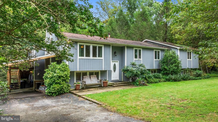 Back on Market
Sometimes life changes direction — the previous buyer got cold feet, which means this beautiful home is available again! Their loss could be your gain. Don’t miss your second chance to make it yours!

Come on down the driveway, pass the garden and chicken coop, and drive up to this wonderful split-level home. On an almost 5 acre lot with mature foliage (including figs, strawberries, blueberries, and kiwi vines) with a serene koi pond in the back, this home is nestled in a peaceful cocoon away from the busy world. 

Enter the split-foyer and choose your own adventure: check out the full basement with tons of possibilities and bonus room for guests to stay in OR go upstairs and check out the open floor plan with great sight lines through the eat-in kitchen and living room. With all the bedrooms on one level, no need to go up and down the stairs all the time. There are even two primary bedroom/bathrooms. This home is a hidden gem waiting to be discovered and made to shine.

As if the house and property weren't enough, there are outbuildings that make the property even more desirable. There's a detatched 3-car port, a two car detached garage with a side entrance and enough room to make an office in, and a huge RV/boat garage that has doors on both ends. If you have many vehicles, construction equipment, or are someone with boats or a RV- this is the place for you. No more paying to store your vehicles.

Come check this property out. You won't want to wonder what-if.