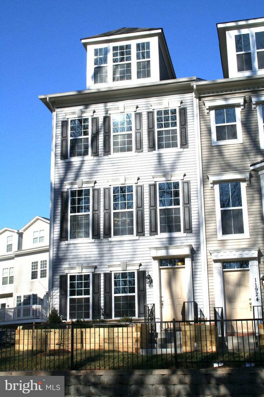 Immidiately available. Beautiful luxury end unit TH. Fresh paint throughout. New flooring. 4-level finished, 3 BR 3 FB & 1 HB. 2-car garage with opener. Modern kitchen with granite counter top, SS appliances. Hardwood floor main level. Master BR w/ sitting, luxury master BA w/ separate tub & shower. 2 other spacious BR w/ private full BA. Bsmt rec rm w/ windows. Large deck...Good credit required.