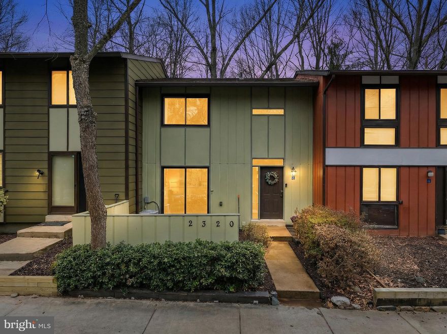 Tucked into a quiet, tree-lined section of Reston, this home is filled with the kind of light and warmth you notice immediately. The main level flows easily from the open kitchen with white cabinetry and stainless steel appliances into the dining and living spaces. It is ideal for hosting friends, working from the table while dinner simmers, or relaxing at the end of the day. Sunlight pours in throughout the home, giving every room an open and airy feel. A convenient powder room on the main level makes everyday living simple. Upstairs, three bedrooms offer flexibility for whatever season of life you are in. Guest space, nursery, office, or a combination of all three. The primary bedroom is complete with a new walk-in closet. A full bath serves the upper level with an easy, functional layout. The finished lower level adds even more space to enjoy. A cozy rec room with fireplace is ready for movie nights or game days. The bonus room makes an ideal home gym, office, or creative retreat. An additional half bath downstairs means guests never have to head upstairs. Out back, a private deck opens to mature trees. It is the perfect spot for morning coffee or unwinding in the evening. Located just minutes from Reston Metro Station, the Dulles Toll Road, and Reston Parkway, commuting is seamless. You have easy access to Reston Town Center, Lake Anne Plaza, miles of trails, parks, lakes, shopping, and dining. Enjoy all the amenities that make Reston so desirable, including pools, tennis courts, and community events year round. This is the home you have been searching for: privacy, natural light, functional space, and unbeatable access to everything Reston has to offer. Updates:  Basement & powder room bathrooms, walk in closets - 2025, Upstairs bathroom, front privacy wall - 2023, Back deck, gutter guards - 2022, Water heater - 2018, HVAC - 2018, Roof estimated - 2011.