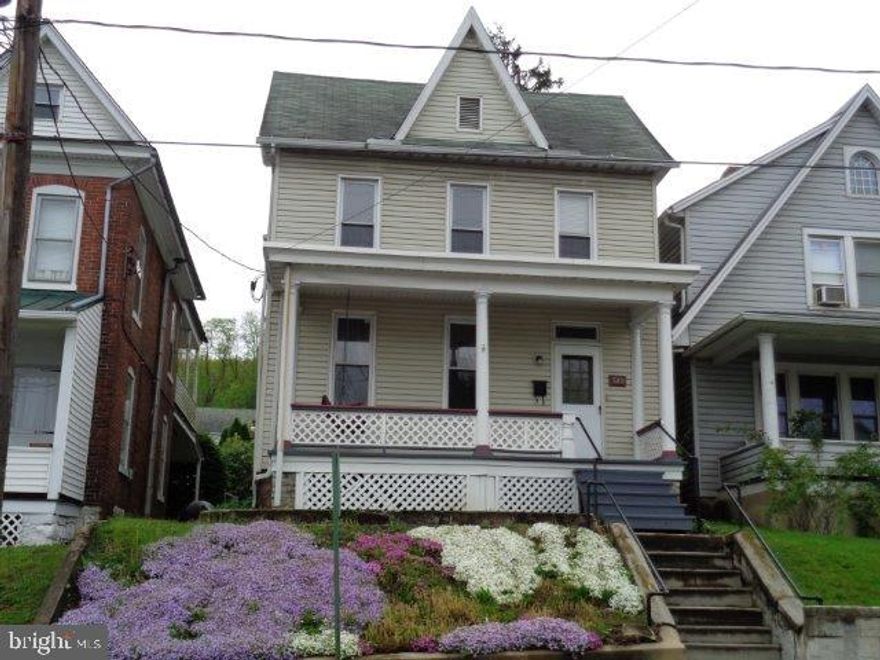 Move-in condition, freshly painted, replacement windows, vinyl siding, additional insulation, updated wiring & electric service, chimney rebricked, detached garage & workshop, off street parking.