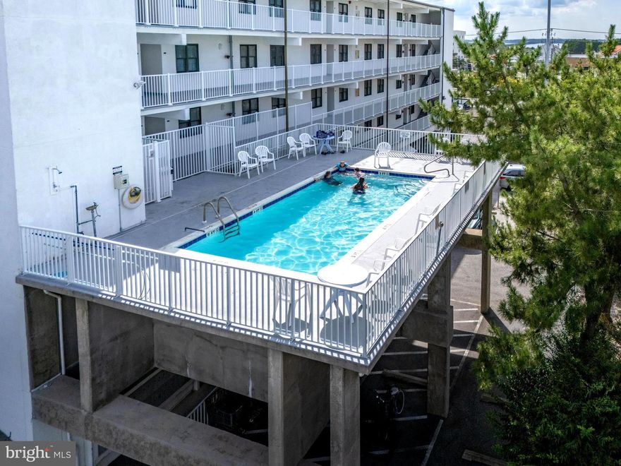 Located in The Sun Rise Sea condos and a great mid-town location, Ocean Block, a stone's throw to the best and cleanest beaches on the East Coast! This condo is turnkey, fully furnished and ready for your enjoyment! Take in the views and sunsets from your oversized furnished private balcony with views of both the Ocean and The Bay!! Enjoy the pool which is located right on the same floor as the unit right down the walkway!! Features master bedroom with 2 queen beds, en-suite full bath, and TV!!  Spacious 2nd bedroom with a queen bed and closet and TV! Enjoy the open floor plan with spacious fully equipped kitchen, living room, dining area, wet bar and 2 sliding doors leading out to the balcony!! There is an elevator and extra wide covered walkways making moving furniture a breeze!  Owners have completed recent improvements in 2021 including fresh paint, new HVAC, new water heater, toilets and kitchen faucet. The second-floor location gives you the option of using either the elevator or the stairs for quick beach trips! The current owners are not renting but due to the location to the beach, the condition of the property, the pool etc., this could make a great rental investment. Rent some weeks in the summer and offset costs while enjoying the beach life you Sunrise Sea units do not come up for sale very often so now is your opportunity to own and enjoy!Please put this property on your list to see!! Call listing agent with any questions and for a private showing!!