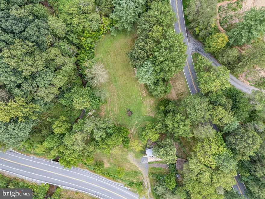 *****MOTIVATED SELLER.  Open to all reasonable offers.***** This unique property is waiting for its special owner.  The existing residence on the property is considered a "TEAR DOWN" which is why the listing type is LAND. Boasting 2.1 acres, the land is mostly cleared, maintained and level making this large corner lot ready for someone to build their dream home. Septic and Well currently actively functioning.  Local Roots & Builders: Yingst Homes, a respected builder from the area, grew up right here in the valley and still calls it home. Outdoor Life & Nature:  In addition to the stream on the property (who doesn't love to drop a hook into a body of water and catch a wriggling prize), there are stocked trout streams just a few miles away, perfect for fishing enthusiasts. The hiking is excellent too—state game lands are right up the road. Ritzie Village has an access point, and there’s another trailhead just a few miles further. Wildlife is abundant: deer, the occasional turkey, frogs, toads, and all kinds of critters roam freely. The residents grew up fishing in the creek and sledding in the yard—it’s a place where nature is part of your everyday life. Comforts & Community: Neighbors are respectful of the privacy of others. If the next owners want a wood-burning stove, there’s plenty of local wood delivery available. Cell phone service is reliable, and the property falls within the Central Dauphin School District.   History & Quiet Charm: There’s charming fireplace on the property—no one’s used it, but it’s been standing since the original house burned down. It’s probably over 100 years old. The owner's niece always dreamed of turning it into a hangout spot with a bonfire or fire pit. It holds a lot of character and potential. Peaceful Living, Convenient Location: It’s quiet here. No highway noise—just crickets, whippoorwills, and sometimes owls at night. The property sits on a state road, so Route 443 is always plowed early in the winter, making commutes easy. You’re far enough out to enjoy country living, but still just 20 minutes from stores, shops, and the casino. Hershey is about 30 minutes away, and Harrisburg is only 20. Come visit us and see how you can create your own memories.