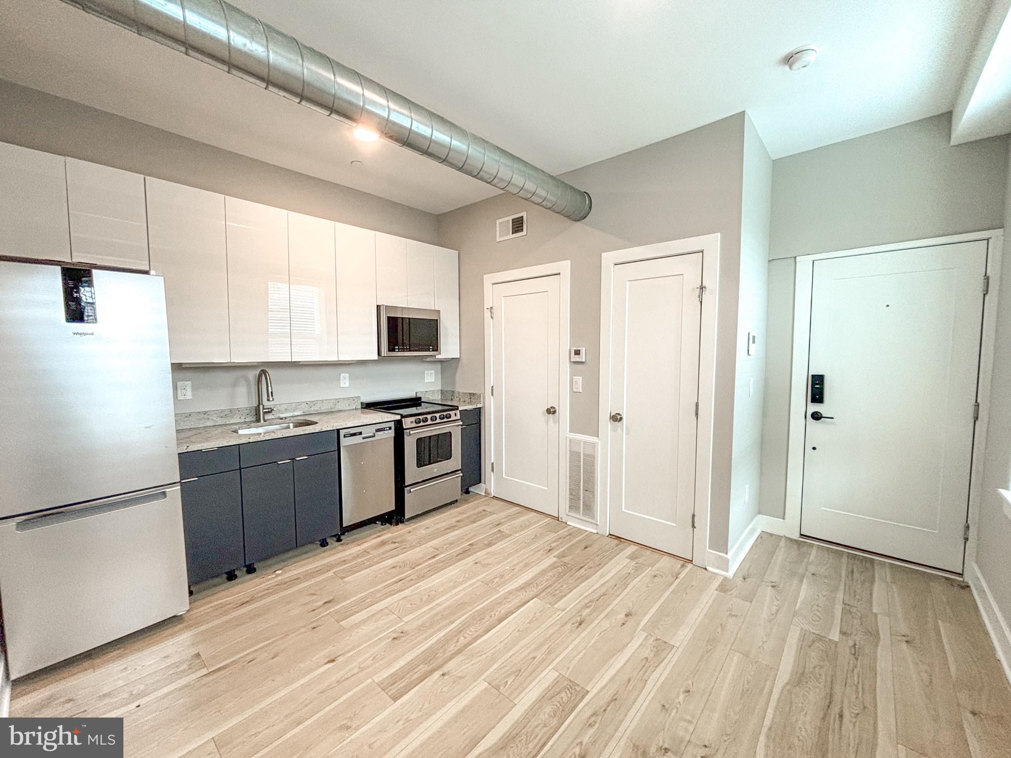 Welcome to 100 W Susquehanna Ave, a charming rental home in the heart of Norris Square! This home boasts 1 bedroom, 1 bathroom, and 400 square feet of living space. Enter into the open concept layout and be greeted by new hardwood floors and large windows allowing tons of natural light. The renovated kitchen features stainless steel appliances, granite countertops, tile backsplash, and tons of white cabinetry for storage. The main level also has a spacious bedroom, in-unit laundry, and an updated full bathroom. Located just right next to Rowhome Coffee and in close proximity to all of the restaurants, bars, grocery stores, and parks that Norris Square has to offer, this home is in a perfect location, schedule your showing today!