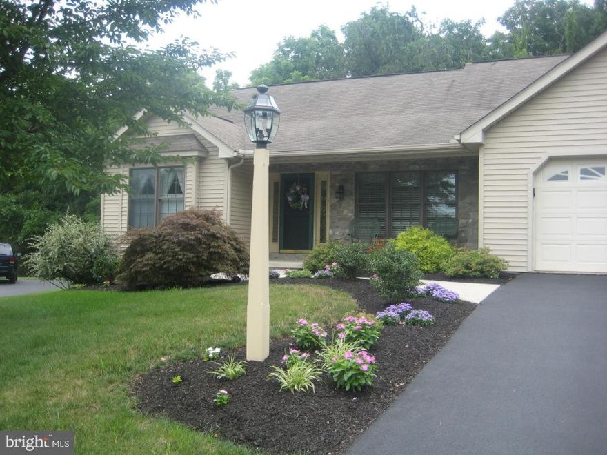 Fabulous custom built Rancher features a bright open floor plan with great room with cathedral ceiling, built in bookshelves and gas fireplace.  Kitchen with cherry cabinets and island.  Master bedroom with crown molding, 2 closets , master bath with custom  cabinetry, double vanities, whirlpool tub and shower, surround sound in FR, kitchen, master bed and bath, 2 additional spacious bedrooms and full bath.