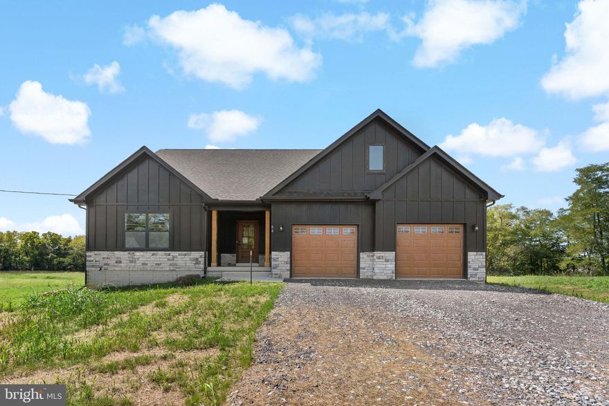 5 +/- acres and horses are welcome! September 2nd 2024 delivery! Gorgeous Craftsman/Ranch style home boasts the sought after split bedroom design. The kitchen/dining combo with island is open to the expansive great room and features vaulted ceilings. Home is larger than it looks. It has a full basement and nice backyard. . Photos are similar construction. Check out these colors that have been selected: Certainteed tuxedo board and batten in the front (black) with stone water table provia drystack with no grout. Black windows in the front with black gutters & black shingles and a medium oak insulated garage door to made this house POP! Home will have a full unfinished basement with a 2 car front loading garage. Agreeable grey interior paint with black fixtures, door knobs and hinges.