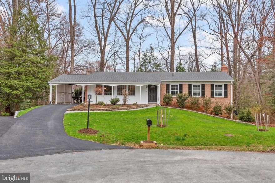 Welcome to 11612 Clipstone Lane, an updated contemporary ranch-style home tucked into a picturesque and welcoming Reston neighborhood. Surrounded by mature trees and thoughtful landscaping, this home blends modern updates with the serene natural setting that makes Reston so special.

--ABOUT THE HOME--
This spacious home has been extensively updated, combining contemporary style with comfortable, everyday living. Maple hardwood floors run throughout the main and lower levels, and large windows and updated patio doors bring in abundant natural light.

The eat-in chef’s kitchen features updated appliances and a new marble backsplash. The adjoining dining room flows seamlessly into the spacious living room, which opens to a large two-level private deck—perfect for relaxing, entertaining, or enjoying morning coffee while bird-watching. You’ll also love the covered front porch overlooking the quiet cul-de-sac.

Three main-level bedrooms offer convenience and flexibility, and the primary bathroom has been beautifully updated with modern tile, frameless shower doors, and stylish fixtures.
Prepare to be impressed by the expanded lower level, which adds approximately 785 square feet of finished space — including additional bedrooms for guests, a home office, or recreational use, along with a huge dedicated laundry room.

Outdoor living is equally divine. A spacious deck overlooks the private yard, while the six-person jacuzzi and extensive landscaping create a serene retreat. A covered patio provides a great spot for watching the game with friends, and a newly paved secondary driveway/parking pad offers plenty of parking.
With major updates including a new roof, windows, HVAC system, and extensive interior renovations, this home is truly move-in ready.

--LOCATION AND LIFESTYLE--
Life on Clipstone Lane means enjoying the best of Reston living. Miles of trails, neighborhood pools, parks, and lakes are just minutes away, making it easy to enjoy the outdoors year-round.
Shopping, dining, and everyday conveniences are nearby at South Lakes Village Center, Fox Mill Shopping Center, and Reston Station, while commuters will appreciate quick access to the Dulles Toll Road and Silver Line Metro at Wiehle.

With its extensively updated interiors, main-level living, and flexible spaces in a tranquil setting, 11612 Clipstone Lane is a rare opportunity to enjoy comfortable living in one of Reston’s most beloved communities.
