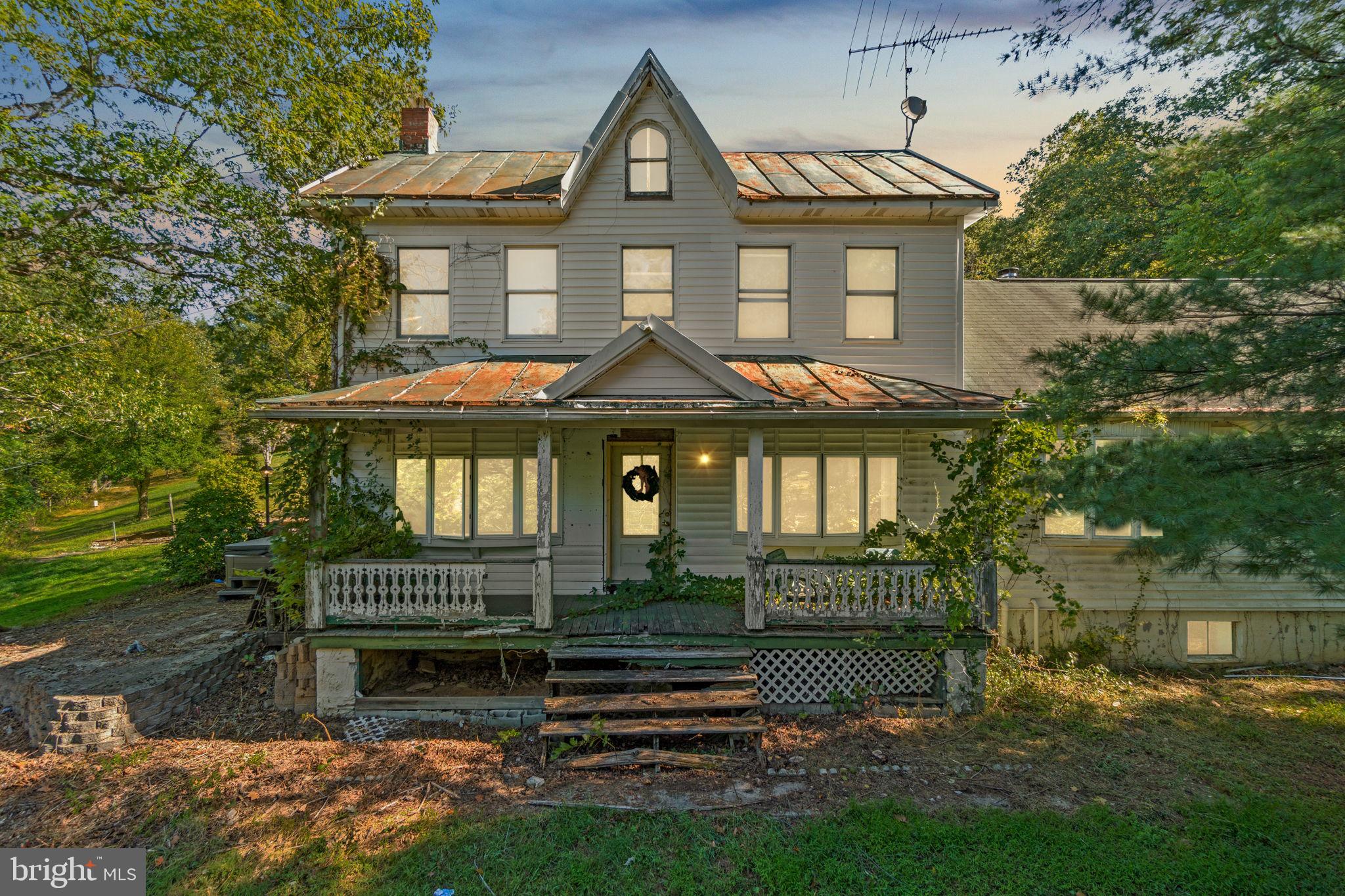 Welcome to 2257 Carrollton Road! Discover the potential in this spacious single-family home set on 3.16 private and serene acres. The main level features a living room, large eat-in kitchen, dining room, family room with fireplace, and a generous primary suite with full bath, jetted soaking tub, and walk-in closet. Upstairs offers three additional bedrooms and a full bath, while the unfinished basement provides plenty of storage or future expansion possibilities. An old barn, hand-dug well, and cesspool remain on the property, offering a glimpse of its history. This home is in need of significant updating and repairs but presents a rare opportunity to create your dream home with plenty of space inside and out. Bring your vision and see the possibilities!