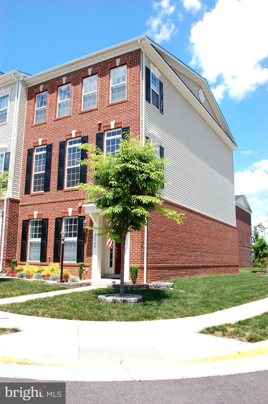 Stunning end unit townhome w/ beautiful attention to detail.  Four bedrooms/3.5 baths/2 car garage. Integrated balcony, nature preserve and walking trails. Community pool, basketball, tennis and tot lots.  Designer touches with crown molding, granite, upgraded baths, expansive kitchen w/large island/breakfast bar. Stunning in all aspects.  This is a 10+. Must see. Tax record inaccurate.  2450 SF