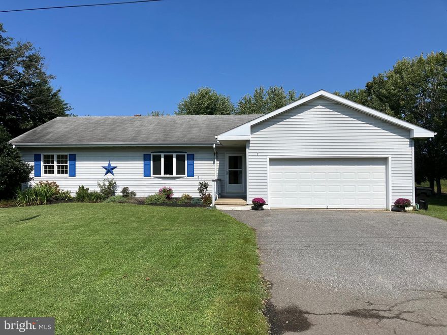 Convenient one-level living in this 3BR, 2.5 bath rancher. The house needs some cosmetic updates, but has a desirable split bedroom layout with the primary bedroom, bath & closet off the kitchen and two bedrooms and another full bath off  the other side of the house. The sun room has a propane stove and exits to a 12' x 15' deck. There's a 10' x 16' shed. (Tractor not included) Nice quiet, in-town location.