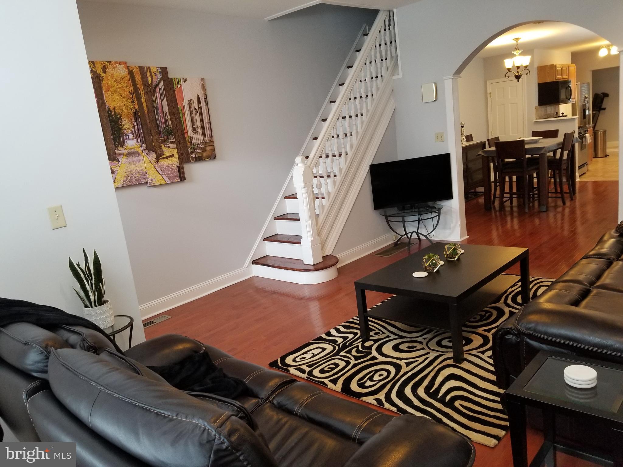 Welcome to 1327 N 29th Street, a charming row home located in the heart of Brewerytown. Featuring an open floor plan, 9ft+ ceilings, hardwood floors, and a tasteful mix of original details and modern upgrades. Main floor washer and dryer with a designated laundry area located just past the kitchen. The central heat, central a/c, ceiling fans, and Nest thermostat will keep you comfortable all year round. The basement is full, clean, and unfinished, perfect for additional storage. New main roof in 2024 with 15 year warranty. Located just steps from Girard Avenue, you'll enjoy easy access to neighborhood hotspots including Otto's Taproom, 2637 Brew, Spot Gourmet Burgers, and Brewerytown Bakery. Walkable to Aldi, Fairmount Park, Art Museum, Philadelphia Zoo, and Kelly Drive. A must see!