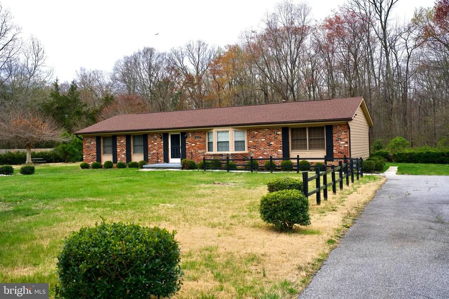 Welcome Home!

Nestled on a picturesque one-acre lot, this one-level brick rambler invites you to experience the tranquility of suburban living with all the conveniences at your fingertips in a beautiful setting.

As you step inside, you'll be greeted by a well-maintained gem boasting ample space and timeless charm. The expansive living room offers a warm and inviting atmosphere, perfect for cozy evenings or entertaining guests. With three bedrooms, including a spacious primary bedroom with a lovely ensuite, comfort and relaxation are guaranteed.

The heart of the home, the large dining room, sets the stage for memorable gatherings and festive holiday dinners. Adorned with gorgeous hardwood floors throughout, the home exudes elegance and character at every turn.

But that's not all - don't miss the Bonus room, a versatile space ideal for entertaining guests, pursuing creative endeavors, or creating a haven for playful adventures.

For added convenience, the laundry room features extra storage, ensuring you have plenty of space to keep things organized and tidy.

Whether you're ready to move in and enjoy the charm of this home as is, or envisioning a personalized  make-over renovation to make it uniquely yours, the possibilities are endless.

Step outside to discover the backyard oasis, brimming with potential for outdoor entertaining, gardening enthusiasts, or simply unwinding amidst the serene backdrop of the wooded area beyond. Imagine summer barbecues, leisurely afternoons or quiet evenings under the stars - all within the comfort of your own home. There more than enough space to play or for your furry friends to exercise.

Conveniently located just moments away from local schools, parks, shopping, and dining options, this home offers the perfect blend of suburban tranquility and urban convenience. With easy access to major thoroughfares, commuting to nearby cities is a breeze.

Don't miss your chance to make this charming residence your own - schedule a viewing today and experience the allure of suburban living at its finest. This house is truly a must-see!
