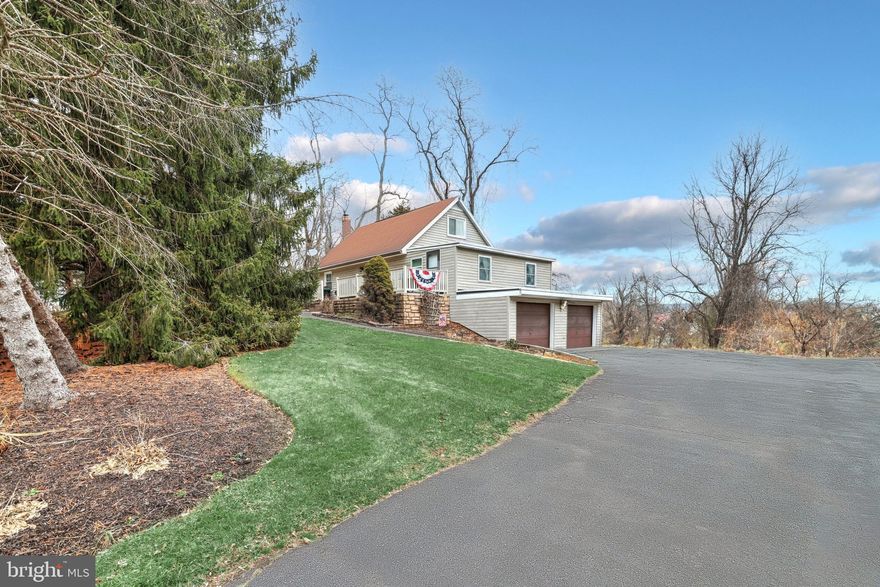 Charming Cape Cod in West Shore Schools.  Just miles from I-83 you'll find this home tucked away off of Lewisberry Rd. Step inside to the open floor plan, updated kitchen with coffee bar and kitchen island, large dining area  and living room. The first floor also includes the primary bedroom, laundry room, and full bath. Upstairs you will find 2 well sized bedrooms and extra storage.  The basement has a rough-in for an additional full bathroom, as well as plenty of storage and space for a rec room.  Through the basement you have access to the oversized 2 car garage with heat and room for a workshop.  This beautiful property also features a large parking area, roughly 3/4 of an acre, fire pit, garden beds, side yard with a deck,  and a front porch that runs the length of the home.  This home is perfect for any outdoor enthusiast located  within a few miles of Pinchot Park and Ski Roundtop. You will not want to miss this one!