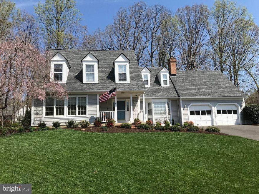 This charming home has newly renovated, SHOWSTOPPING KITCHEN with quartz countertops and a huge island, white cabinets, backsplash and stainless appliances.  New hardwood floors throughout the main floor, a sunroom & study with stained glass entry. 4 large bedrooms upstairs, and a sitting room with the master suite.  Private & Beautifully landscaped yard. New Roof & New Finished Basement included.