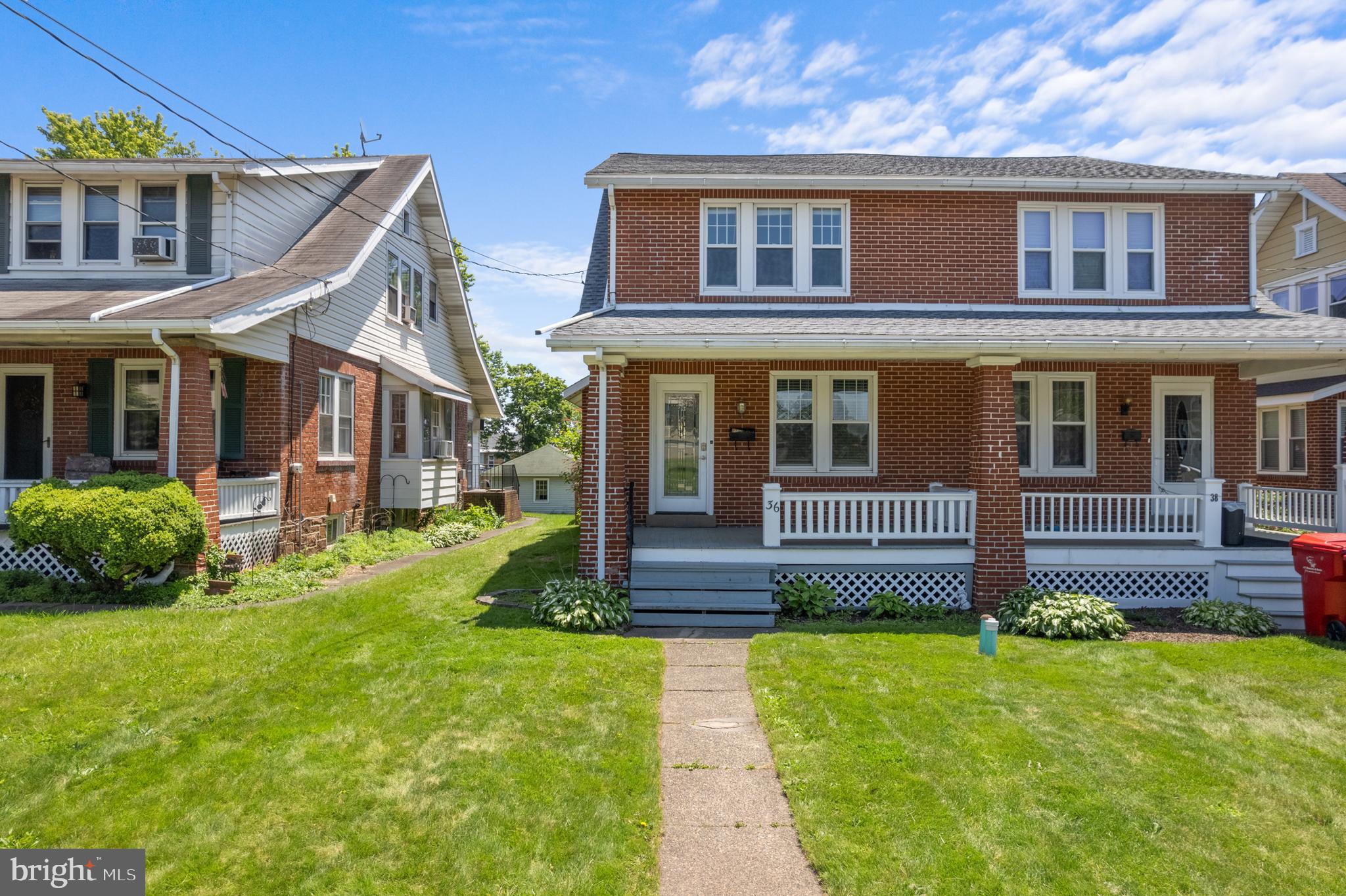 Charming and Well-Maintained Brick Twin in Souderton Borough! This lovely home is ideally located within walking distance to downtown Souderton, the community park, and the pool—offering both convenience and lifestyle. The first floor features beautiful hardwood floors in the spacious living and dining rooms. The updated kitchen boasts quartz countertops, vinyl tile flooring, a Bosch dishwasher, induction stove, and a convenient powder room to complete the main level. Upstairs, you'll find three bedrooms, all with hardwood flooring, and a full hall bath. The third floor offers a large 15’ x 19’ bonus room with brand new carpet, which could be utilized as a playroom, office, or additional living space. Additional updates include a new roof, new hot water heater and new electrical panel. Enjoy outdoor living with a fenced backyard and a 1-car detached garage, great for storage. A fantastic opportunity to own a move-in ready home in a great location!