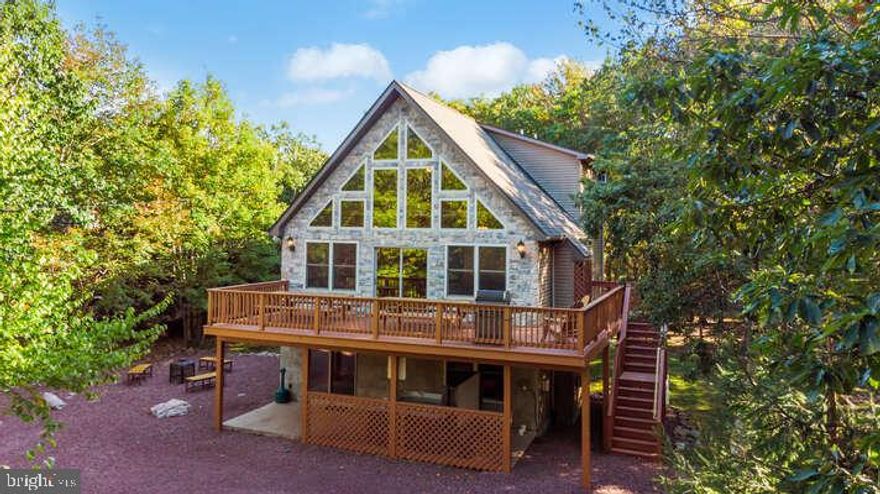 Spring has finally sprung & ready to bloom is this 6BR/3Bath home boasting the perfect blend of comfort & opportunity nestled in the heart of Lake Harmony. Built as an investment property it has enjoyed years of consistent success as an STR & can easily make an ideal 2nd home for family & friends looking to getaway. This prime location offers four seasons of diverse amenities with easy access to restaurants, boating, fishing, skiing, and so much more. Continue the rental legacy in STR friendly community of Lake Harmony Estates or create your own personal sanctuary; this lake community gem is ready to welcome you and your wildest imaginings. Expand your  portfolio with a great investment, I've got the key!