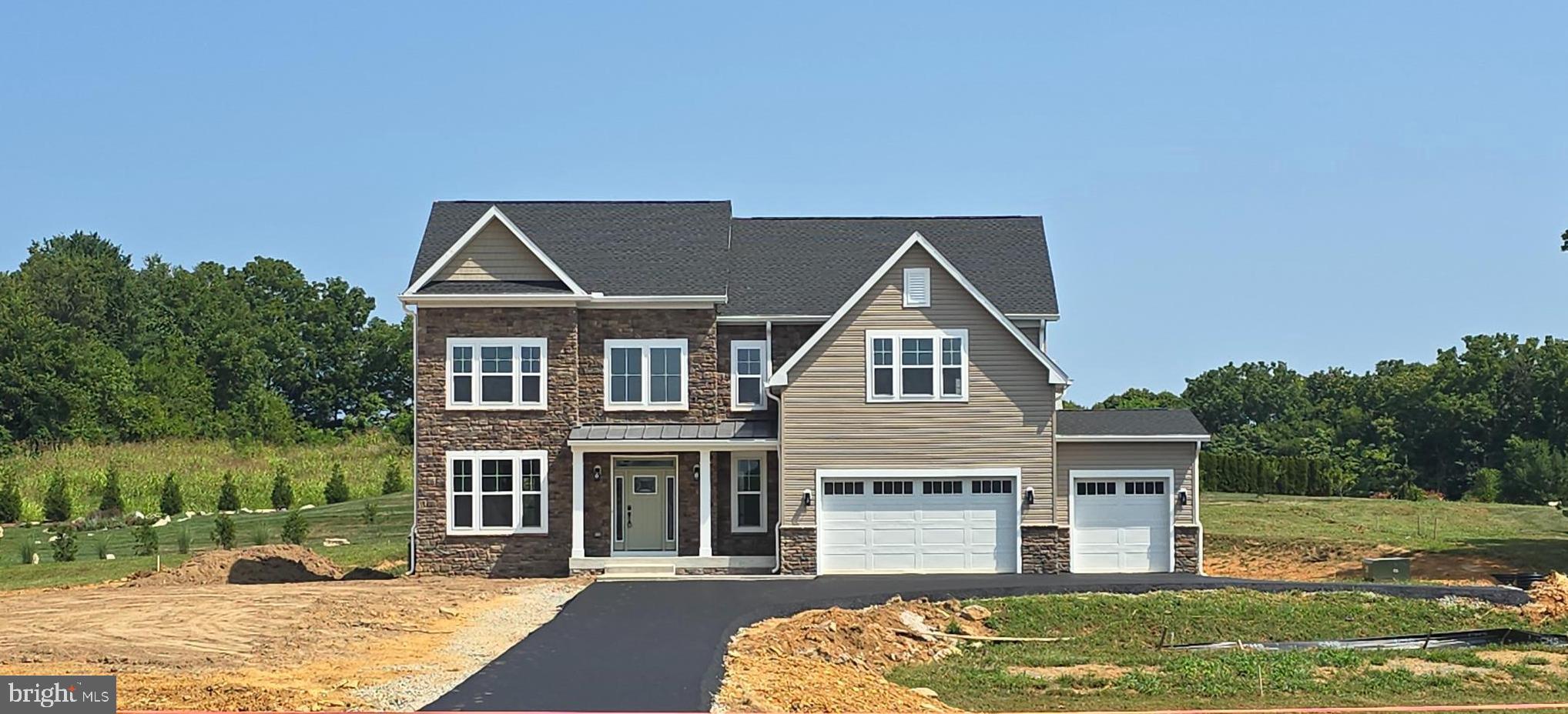 Welcome to the newly built Esther model by Kellgard Construction. This stately 4 bed, 2.5 bath home sits on over an acre at the end of a long driveway. The main level has beautiful luxury vinyl plank flooring throughout its open floor plan. The kitchen is the heart of the home with an oversized island with modern pendant lighting, upgraded stainless appliances, quartz countertops, and a large, light filled morning room overlooking your backyard. This home also offers a formal dining room along with a lovely open staircase and powder room, On the 2nd level you will find the Primary bedroom with tray ceiling and fan, an ensuite bath with dual vanity and soaking tub, as well as a walk-in closet. There are 4 additional, generously sized bedrooms with ceiling fans and full bath, along with a convenient bedroom level laundry. If you still want more space, the full, unfinished, walk-up basement offers space for additional rooms and a full bath rough in.