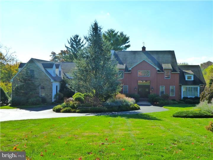 This spacious home is a historic Chester County treasure! The home's approach is via a circular drive past beautiful gardens full of blooms and specimen trees. A decade ago, this property underwent a rebirth from a circa 1850 barn to today's magnificent home. The warm wood tones of the old barn beams throughout the house add charm and warmth. There is a splendid blend of wide open spaces as are found in the Entry and Family Room as well as cozy formal spaces as are found in the Living and Dining Rooms. You will love the luxurious first floor Master Suite! The vast Lower Level is a great spot for large scale entertaining for events like a glorious Super Bowl party! Your family and guests will enjoy the private in-ground pool. Looking for a private spot for in-laws? The Pool/Guest House offers two bedrooms and one and a half baths as well as a full Kitchen - plus its own private entrance from Folly Hill Road! This property is really special!
