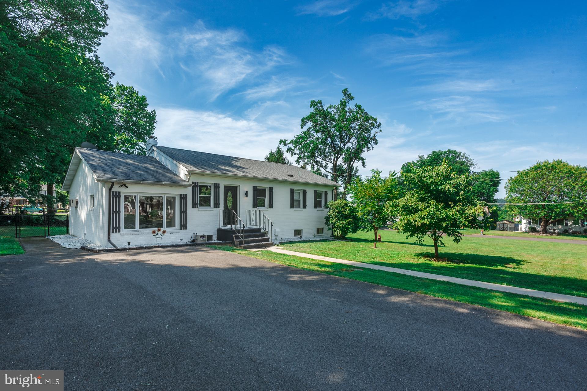 Welcome to 1711 3rd Street in Langhorne, a move-in ready rancher tucked away on a spacious corner lot with so much more than meets the eye. This property offers not only a beautifully updated interior but also a rare opportunity with a large lot that may be subdividable and buildable (check with township). Whether you’re looking to enjoy the extra space or explore its potential, this is a unique chance to make it your own.
Step inside to a bright and inviting living space with updated LVP wood-style flooring throughout and new carpet in all three bedrooms. The garage has been converted to additional living space, expanding the layout and giving you more flexibility—think home office, family room , or a big dining room. The kitchen has been thoughtfully updated with modern finishes, stylish cabinetry, and newer appliances. Both the full and half bathrooms have also been refreshed, giving the home a clean, comfortable feel from end to end. There's also a full unfinished walkout basement if you wanted to add even more space.
This property features some serious system upgrades too. You’ll find a state-of-the-art reverse osmosis UV- water filtration system for the private well, ideal for clean, great tasting water. There’s also a new electric hot water heater, and an updated 200+ amp electric panel. Move in with peace of mind with major updates already done for you.
Outdoors, the home sits on a flat, open lot, offering plenty of room for gardening, recreation, or future possibilities. The extended driveway and quiet corner location add to the everyday ease. And when it comes to location, the Langhorne Gardens neighborhood is tough to beat. You're just minutes from the Langhorne train station, I-95, Route 1, and other major roadways, making it a commuter-friendly spot without losing that tucked-away neighborhood feel.
This is one of those homes that feels easy to picture yourself in, comfortable, updated, and a lot full of potential. Don’t miss your chance to check it out.