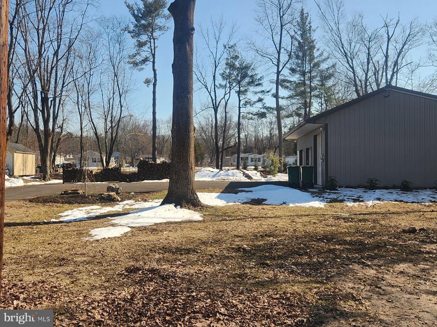 Half acre building lot in Doylestown Township, fully improved and approved to build a beautiful contemporary  chalet-style Colonial. Owner went through a full subdivision approval & installed public sewer and well water to the property. Lot has a large Pole Barn & is professionally landscaped with 38 beautiful American Heritage Birch trees at the back of the lot to provide privacy. 27 large mountain boulders to create back drop and can be used for a firepit area with 37  Skip Laurel bed trees providing additional privacy. The lot is approved to utilize the 20 x 40 existing pole barn that exists on the property. The approved plan incorporates a breezeway to access the existing pole barn. The purchase will include all plans and permits to build. Ready to go to build your dream home.