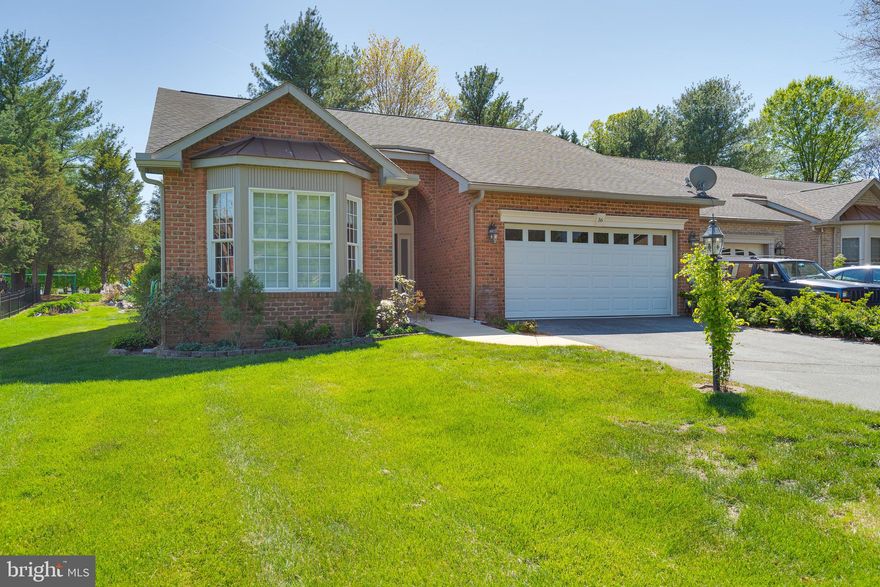 Stunning 2BR/2BA All-Brick Villa – Spring Mills, Falling Waters, WV

Beautifully updated 1,532 square foot 1-story end unit villa with vaulted ceilings, wood floors throughout, and a cozy wood-burning fireplace. Features include an upgraded kitchen and baths, all high-end appliances (washer/dryer included), 14 x6 foot primary bath plus walk in closet and a spacious 2-car garage. Too many upgrades to list - see pictures.  Enjoy outdoor living on the rear deck and convenience of a paved driveway.  Located in Spring Mills subdivision with community pool, tennis courts, playground & walking trails. Easy access to I-81 (Exit 20).