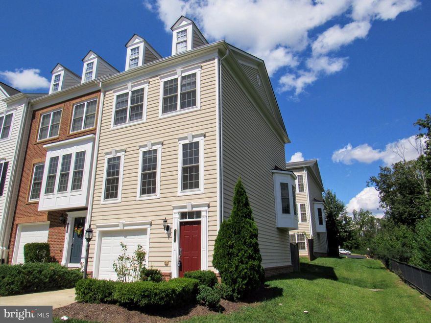 Gorgeous end-unit townhouse on quiet street. Beautiful kitchen with like-new cabinets and striking granite counters.  Breakfast room w/ floor to ceiling bay windows and serene forest views. All 3 full BAs in pristine condition with like-new ceramic tile. MBA with soaking tub. Great amenities in Potomac Club Condos including indoor/outdoor pool, tennis, business center, secure entrance, and more.
