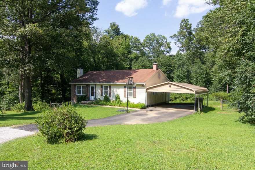 Welcome home to this remodeled rancher home! Freshly painted, gorgeous NEW laminate/engineered flooring! Living room with wood burning fireplace to warm up on cool evenings and built in book cases. Nice kitchen space and open eat in area off of the kitchen! 3 bedrooms on the main level and a full bath.  The basement offers a media room, a recreation room and a full bath, storage room, washer and dryer, and a sanitary tub.  There is a ground level exit to the yard from the basement. Large deck and a fenced yard.  You will be delighted with this home from the NEW interior improvements to the wonderful fruit trees and more in the back yard! ***PROFESSIONAL PHOTOS COMING SOON!***
