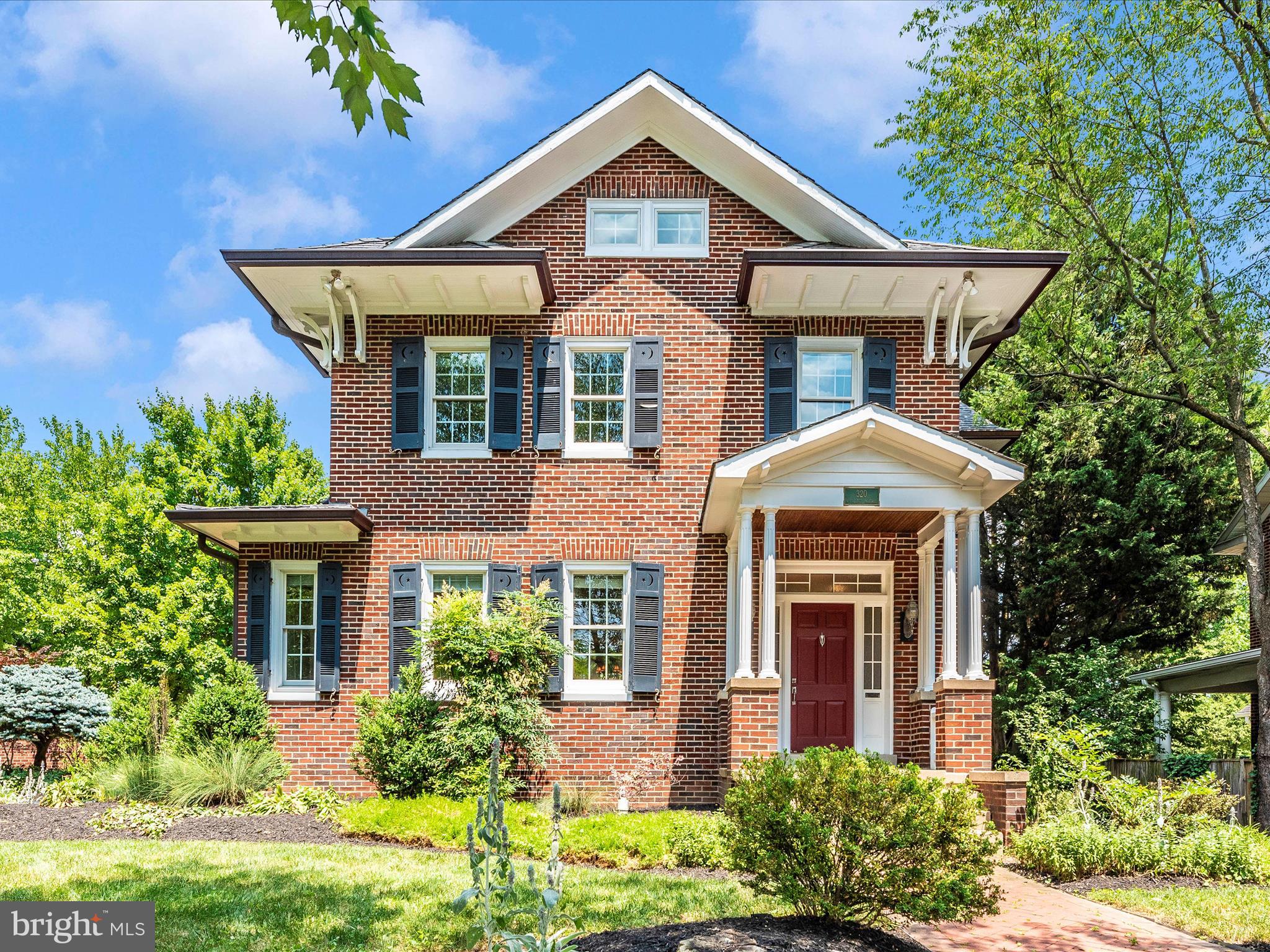Nestled in the highly sought after Baker Park neighborhood, this stately all brick home with slate roof and copper gutters offers three beautifully finished levels on a large, manicured corner lot. This well-maintained home is situated in the ideal location, just a few blocks to historic downtown Frederick through Baker Park and across from Hood College. Enjoy relaxing in the large living room complete with an inviting gas log fireplace with original mantle. The bright, airy kitchen is complemented with cherry cabinets, granite counters, stainless steel appliances and a walk-in pantry with abundant storage. Character abounds with the attention to details such as custom moldings, original quarter sawn oak floors, updated bathrooms with marble flooring all enhanced by the natural light filtering through the many oversized windows and French doors. There are 9’ ceilings on the first and second floors. The finished lower level is complete with slate floor, storage, and an updated laundry room with utility sink. A full walk-up attic with windows and flooring offers plenty of additional storage space. This beautiful property also offers a well-appointed, custom-built, oversized detached two car garage with a fully finished upper level. This space is air conditioned and heated making it ideal for your “out-of-the-home” office or gym just steps away from the main home. The garage was constructed with meticulous attention to architectural details coordinating with the original home such as brick exterior, slate roof, copper gutters, cedar corbels, and a brick driveway. There are three lovely, covered porches that lead to the home’s outdoor living experience with its brick privacy walls, mature landscaping and extensive custom hardscaped walkways and patios perfect for relaxing in front of a firepit on those cool nights and entertaining your family and friends. Major house renovation in 2000, Garage/patio/wall 2003, major house improvements 2018.