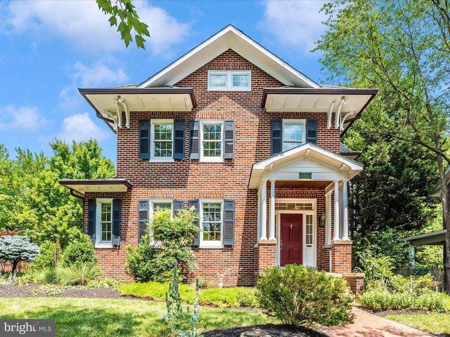 Nestled in the highly sought after Baker Park neighborhood, this stately all brick home with slate roof and copper gutters offers three beautifully finished levels on a large, manicured corner lot.  This well-maintained home is situated in the ideal location, just a few blocks to historic downtown Frederick through Baker Park and across from Hood College.  Enjoy relaxing in the large living room complete with an inviting gas log fireplace with original mantle.  The bright, airy kitchen is complemented with cherry cabinets, granite counters, stainless steel appliances and a walk-in pantry with abundant storage. Character abounds with the attention to details such as custom moldings, original quarter sawn oak floors, updated bathrooms with marble flooring all enhanced by the natural light filtering through the many oversized windows and French doors. There are 9’ ceilings on the first and second floors. The finished lower level is complete with slate floor, storage, and an updated laundry room with utility sink. A full walk-up attic with windows and flooring offers plenty of additional storage space. This beautiful property also offers a well-appointed, custom-built, oversized detached two car garage with a fully finished upper level.  This space is air conditioned and heated making it ideal for your “out-of-the-home” office or gym just steps away from the main home.  The garage was constructed with meticulous attention to architectural details coordinating with the original home such as brick exterior, slate roof, copper gutters, cedar corbels, and a brick driveway.  There are three lovely, covered porches that lead to the home’s outdoor living experience with its brick privacy walls, mature landscaping and extensive custom hardscaped walkways and patios perfect for relaxing in front of a firepit on those cool nights and entertaining your family and friends.  Major house renovation in 2000, Garage/patio/wall 2003, major house improvements 2018.