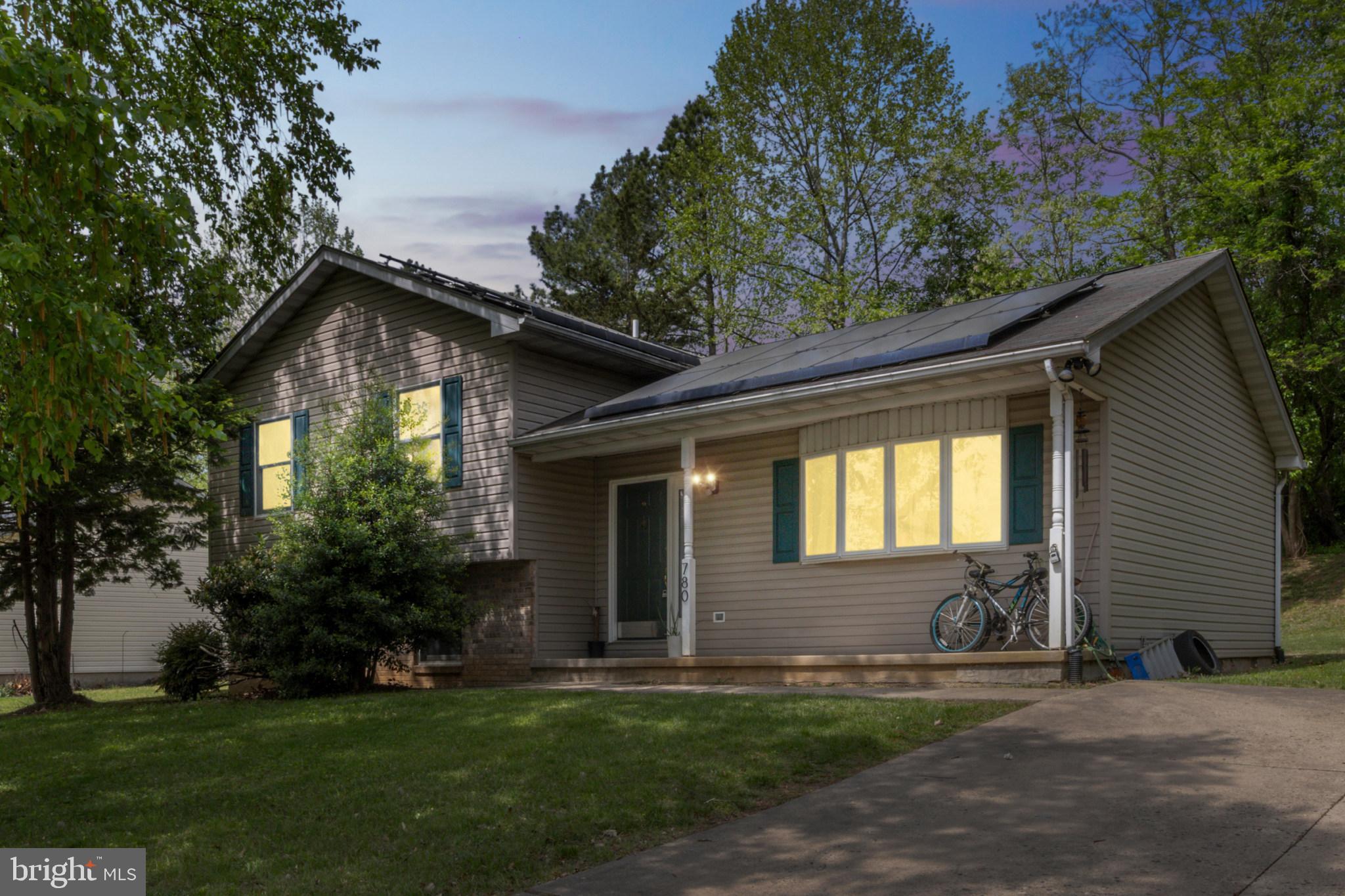 This charming Aberdeen home is ready to impress from the moment you arrive. The covered front porch and brick accents offer standout curb appeal, inviting you right in. Inside, the light-filled living room boasts a gorgeous bow window, gleaming hardwood floors, crown molding, and chair rail detailing. A handy entryway shelf with hooks adds convenience and charm.
The updated kitchen features stainless steel appliances (all convey!), an oversized pantry wall for ample storage, and sliding glass doors that lead to the rear patio—perfect for entertaining or relaxing outdoors. Downstairs, the cozy family room is anchored by a stone-accent accent wall and a ready-to-use projection wall (yes, the projector can stay!). You’ll also find a built-in reading nook with shelving, a powder room, and a fourth bedroom on the lower level.
Upstairs, the primary suite includes a private bath, and two additional bedrooms share a full hallway bath. Additional highlights include central air, a newer heat pump (just 2 years old!), a spacious backyard that backs to woods, a large shed, and a concrete driveway.
This home blends traditional charm with smart updates—schedule your tour today and make this your new address!