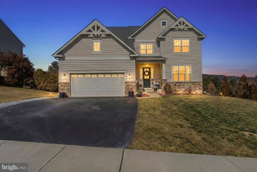 Gorgeous 4-Bedroom, 4.5 Bath Colonial in Saber Ridge Community.  Beautiful countryside scenery surrounds you.  There's plenty of living space, with 3,600 finished square feet (above grade), and over 1,100 finished square feet of basement.  The high ceilings, big rooms, and gourmet kitchen add extra comfort and a feeling of luxury.  This home lets in plenty of light, and the fireplace only adds to the ambience.  Outside you'll find a fenced-in rear yard, and deck, making this home perfect for entertaining.  There's so much to do here in the community as well.  This home is close to schools, parks, and sports fields.  Homes rarely come on the market in this neighborhood, and it's easy to see why.  Find out for yourself, schedule your showing today!